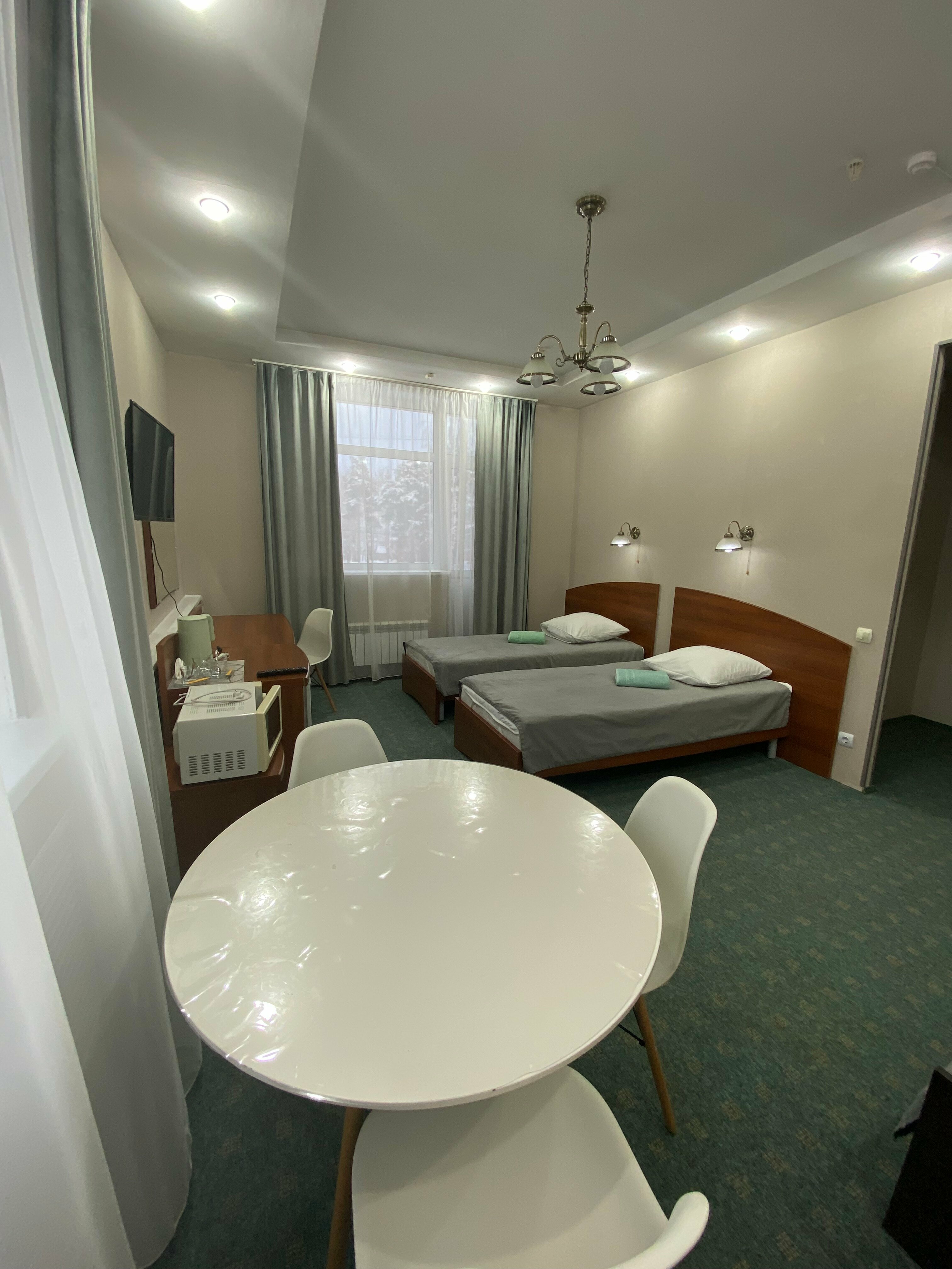 Трехместный номер с балконом