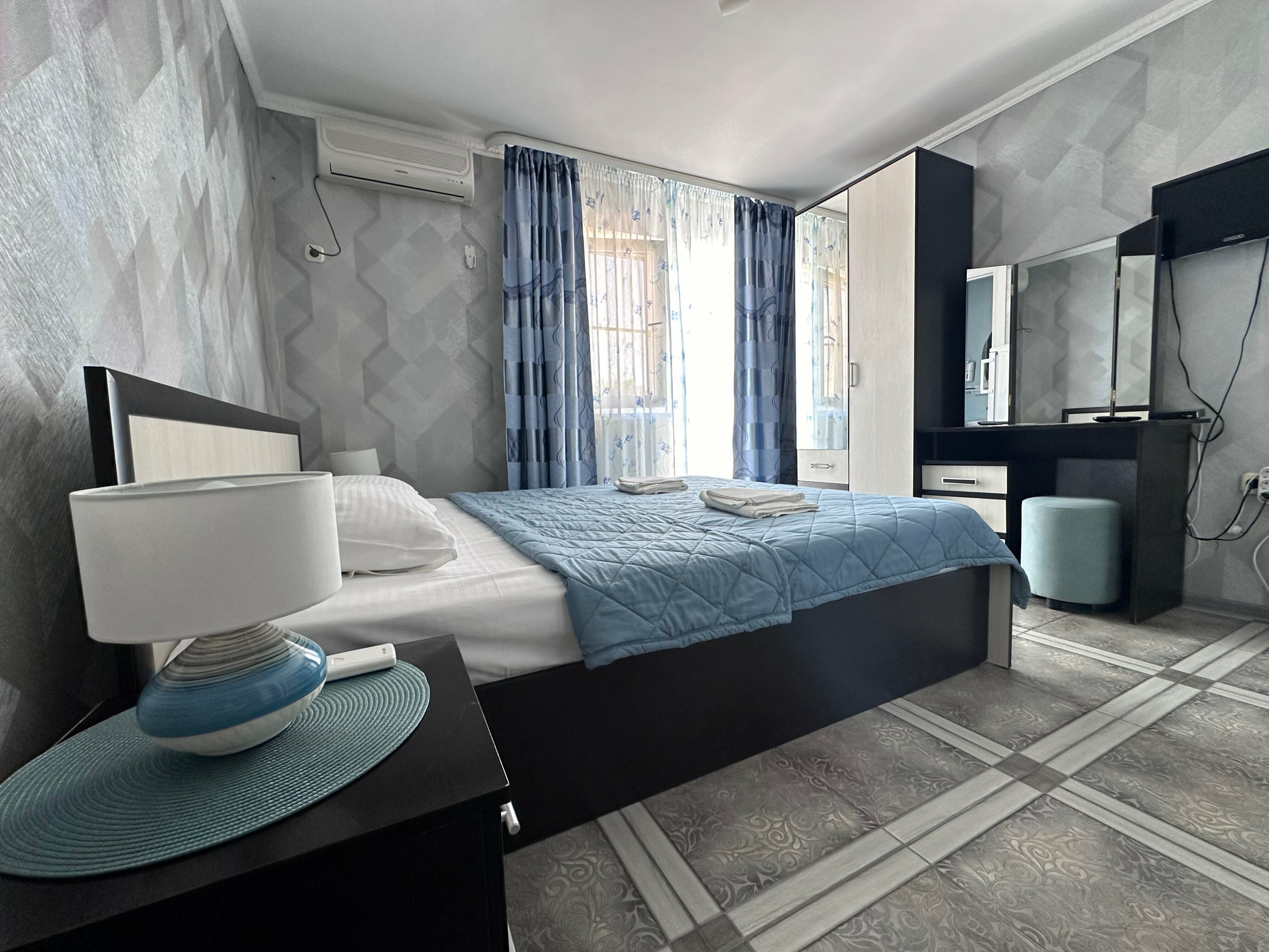 Трехместный номер с балконом