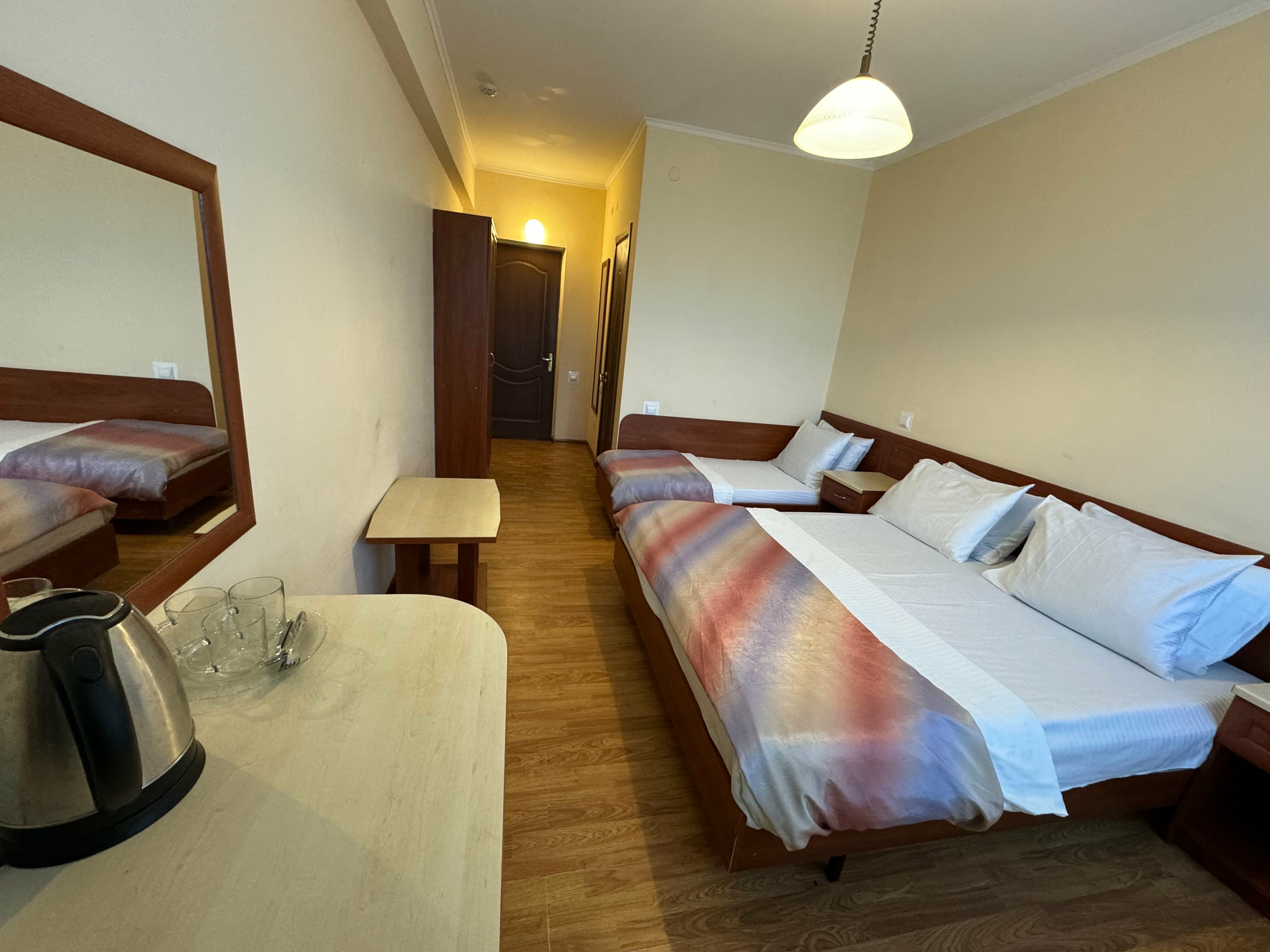 Трехместный номер с балконом