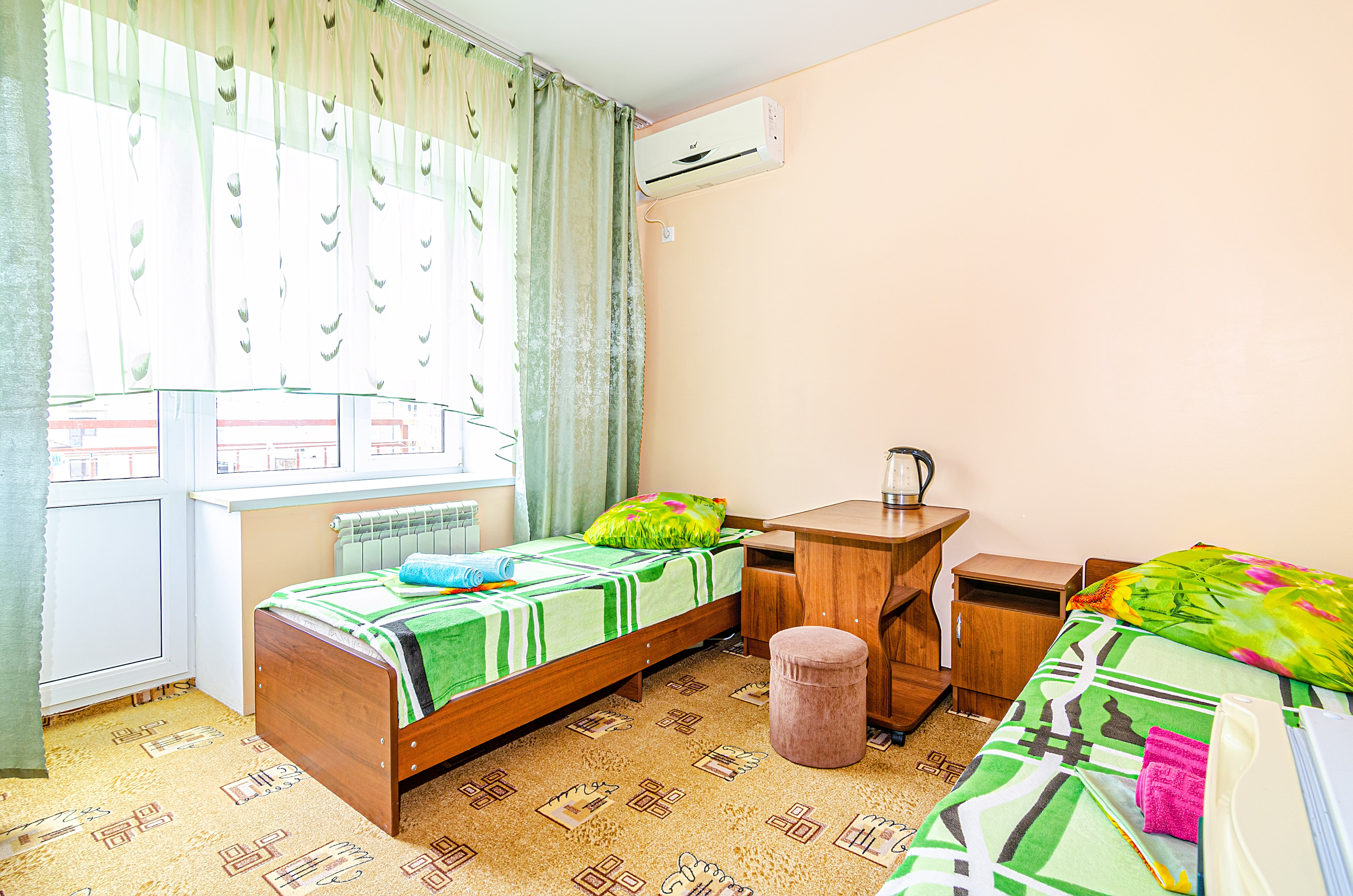 Двухместный номер с 2 отдельными кроватями и балконом