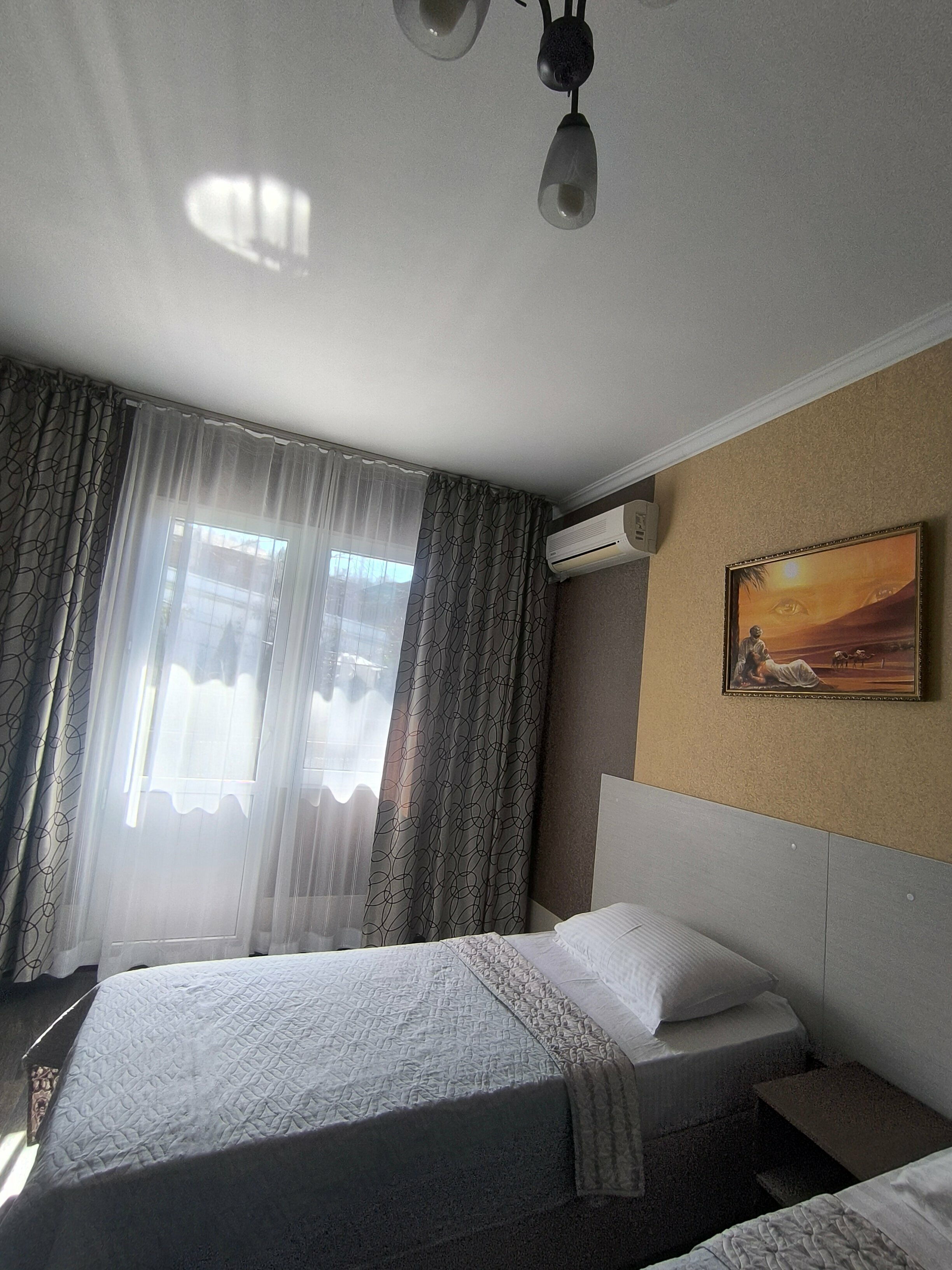 Трехместный номер с балконом