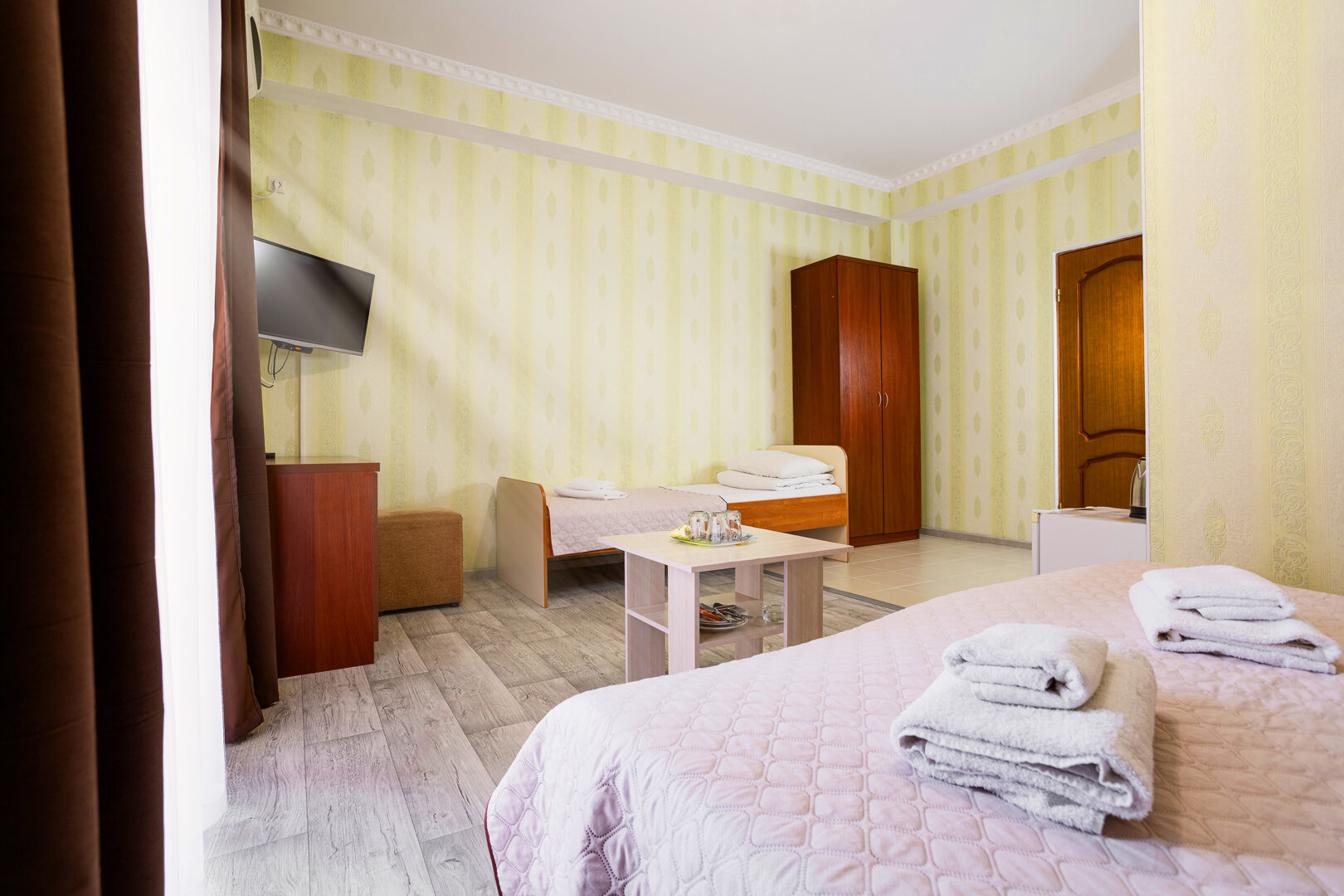 Трехместный номер с балконом