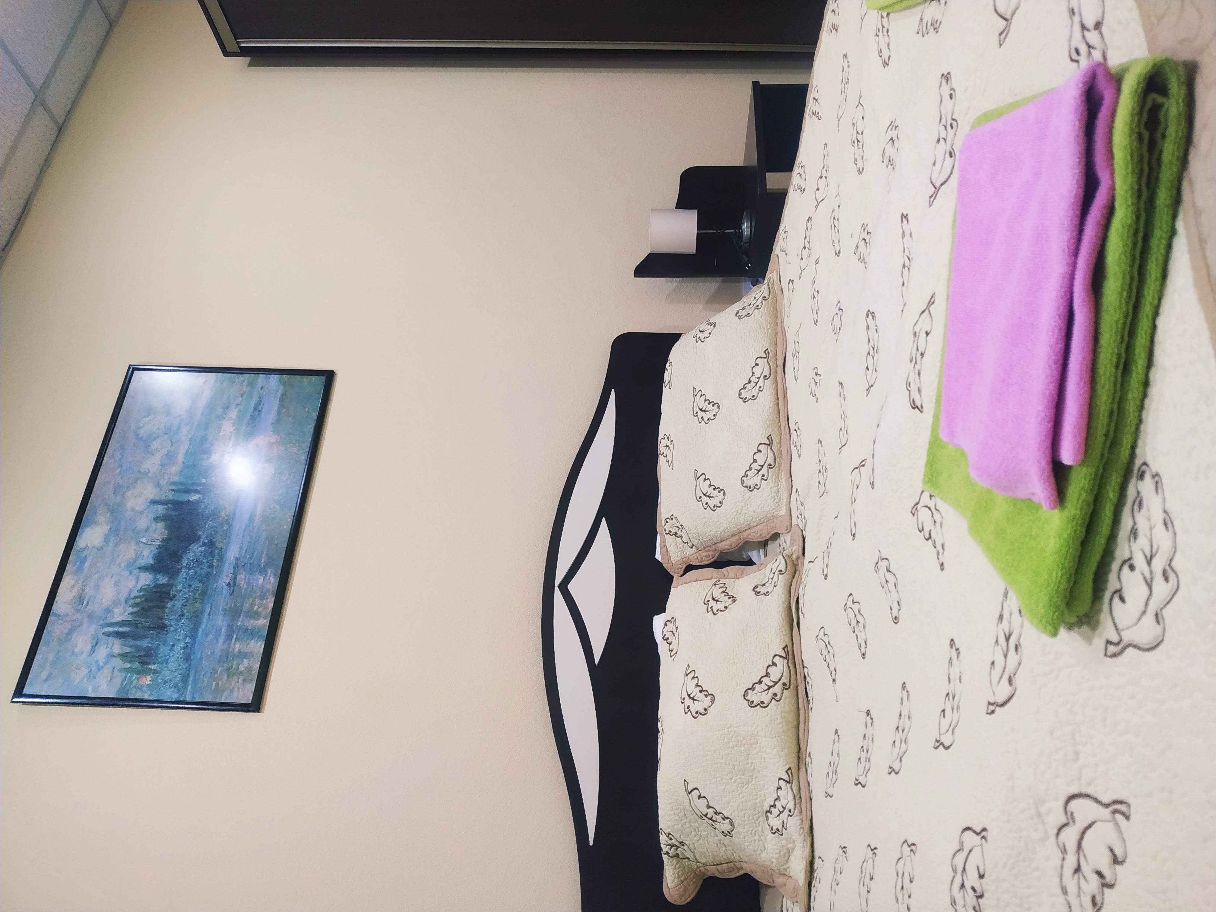 Двухместный номер с 2 отдельными кроватями и общей ванной комнатой