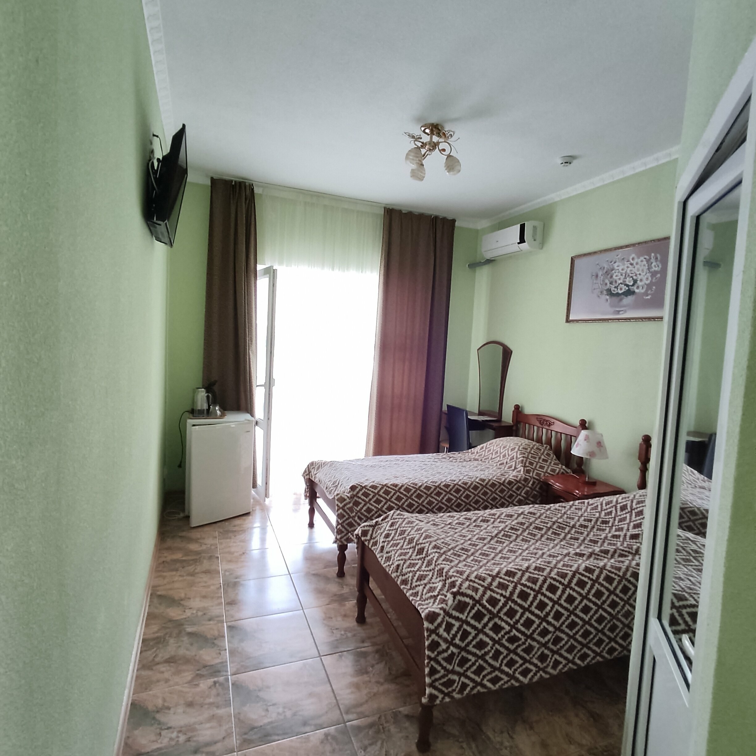 Двухместный номер с 2 отдельными кроватями и балконом