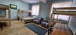 Кровать в общем 8-местном номере в Солнечный