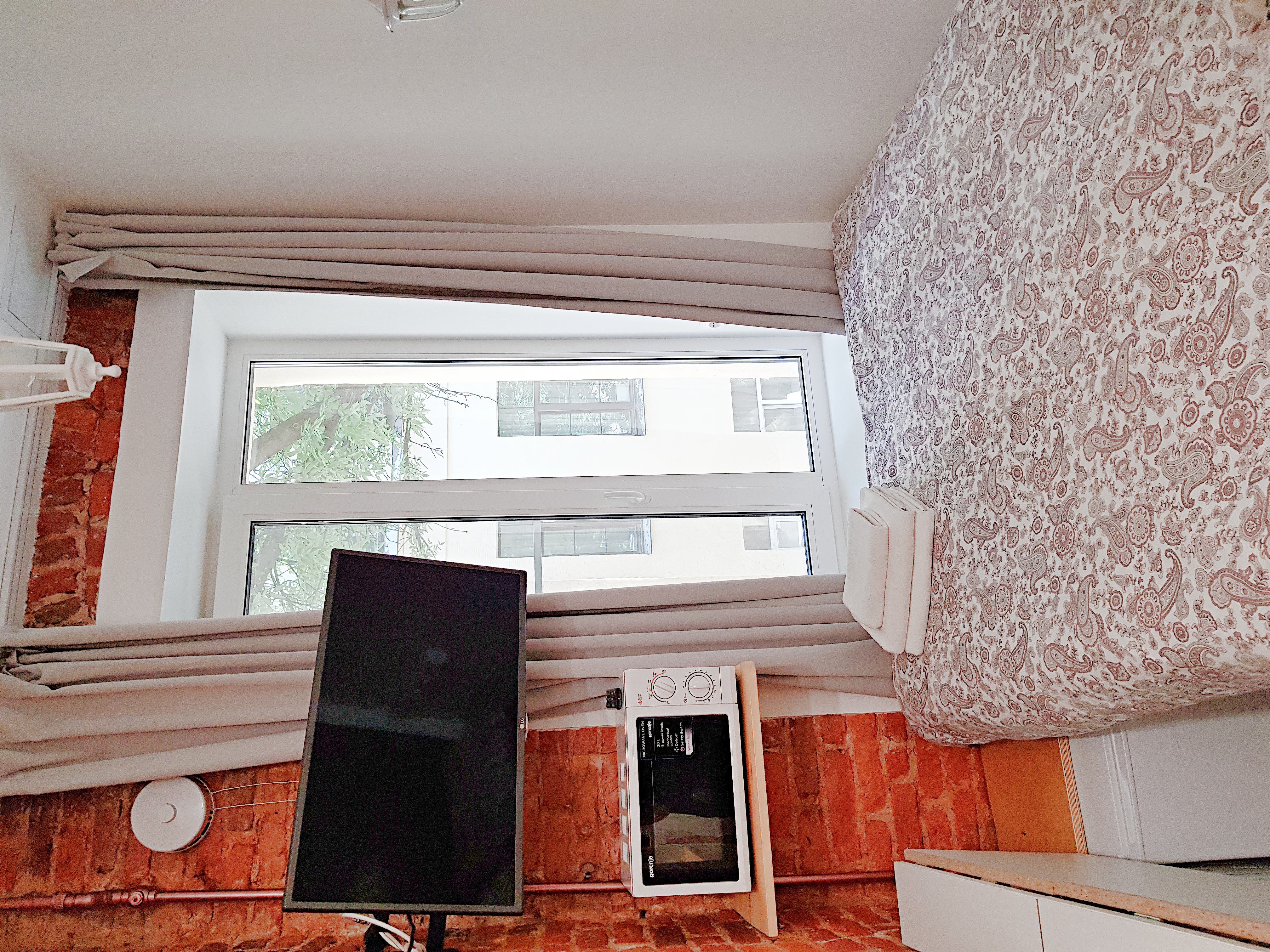 Компактный одноместный номер "с шармом", вид во двор, вмещает 2х гостей