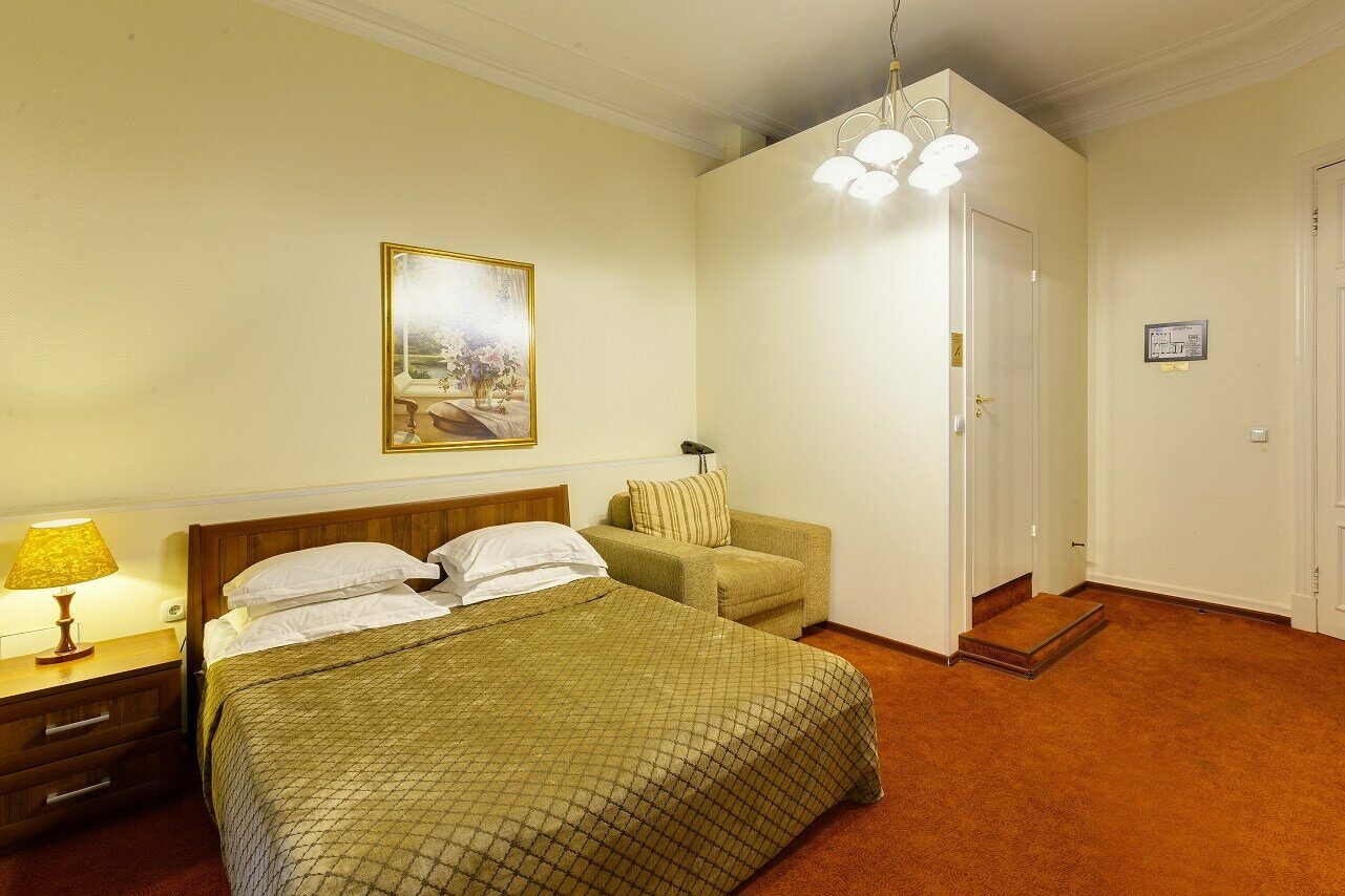 Улучшенный номер с 1 большой или 2 раздельными кроватями (кондиционер)