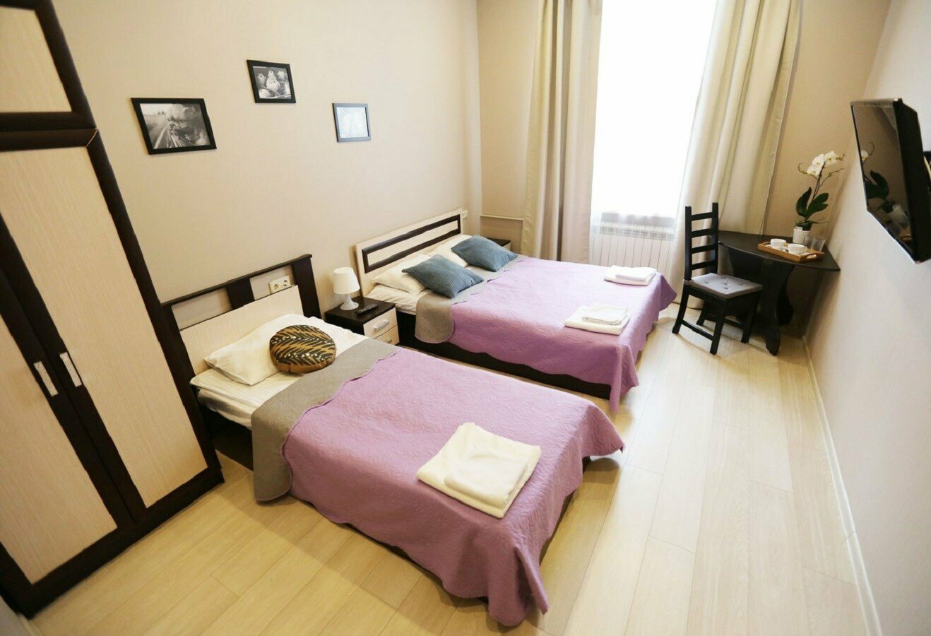 Семейный номер с общей ванной комнатой