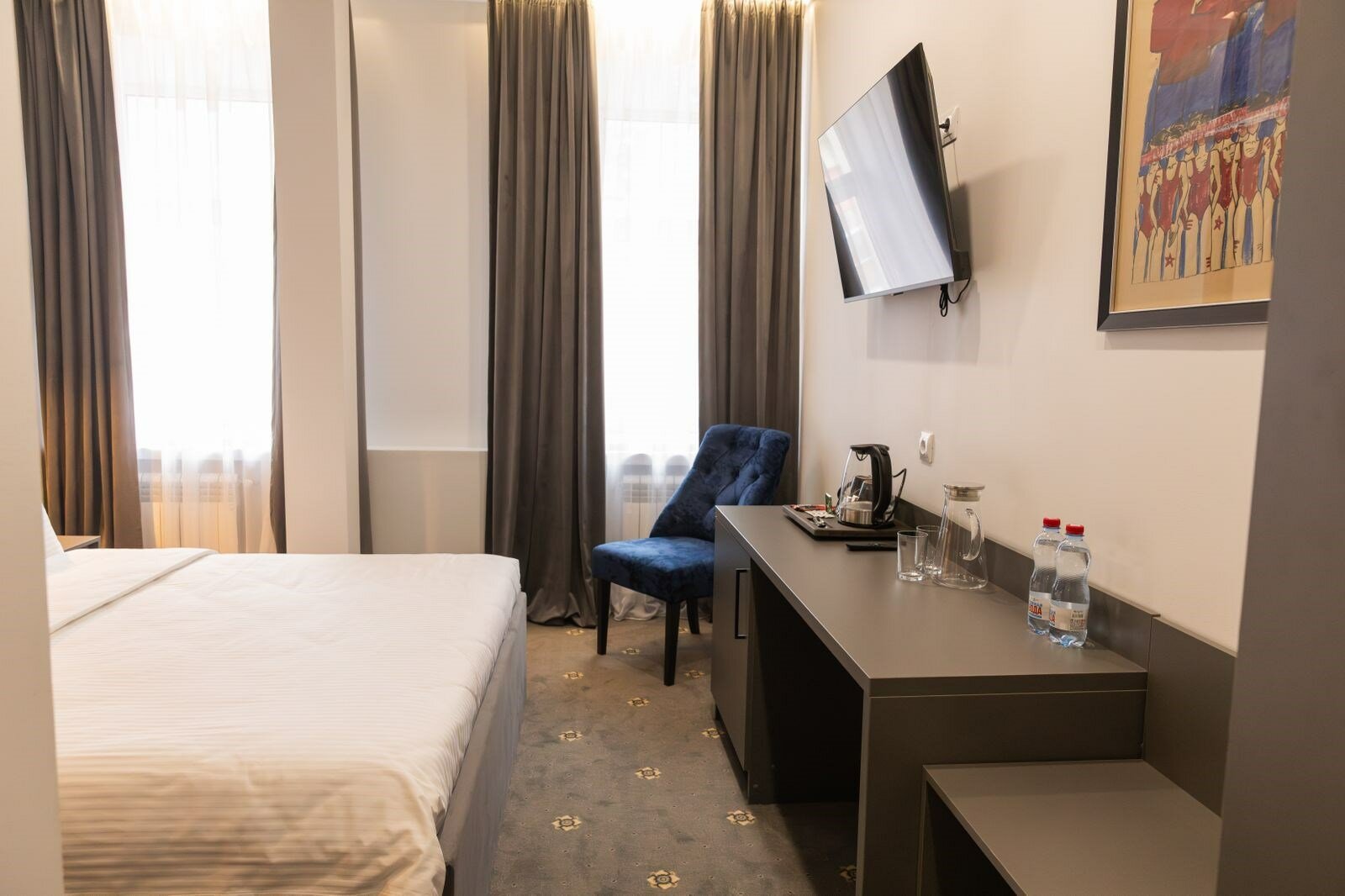 Номер комфорт с одной двуспальной кроватью