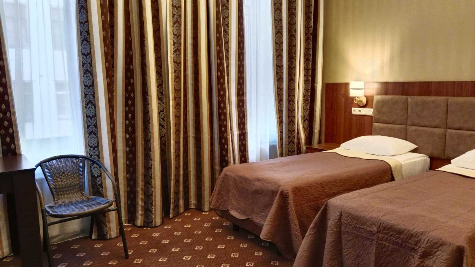 Улучшенный двухместный номер с одной двуспальной или двумя односпальными кроватями