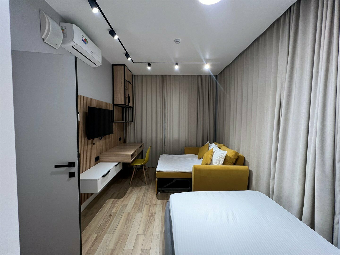 Двухкомнатный номер с кухонной зоной