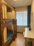 Спальное место на двухъярусной кровати в общем номере для женщин в Золотое кольцо