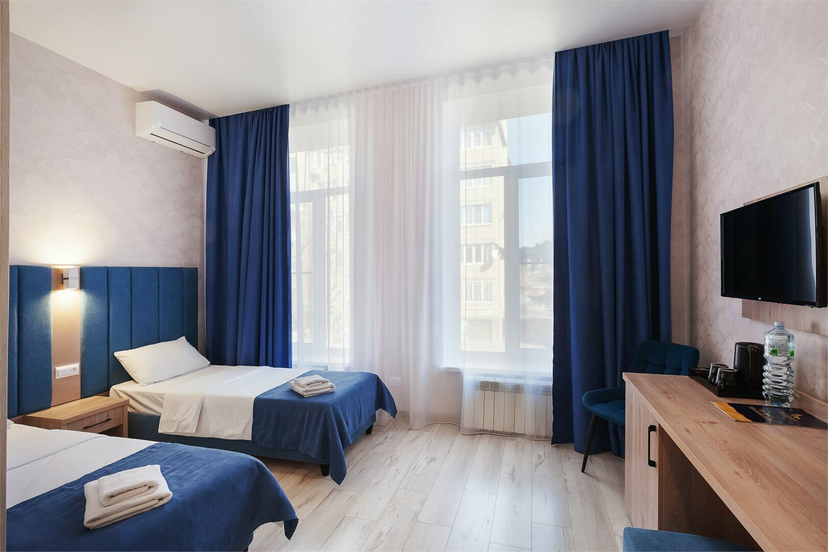 Улучшенный двухместный номер Делюкс с 1 кроватью или 2 отдельными кроватями