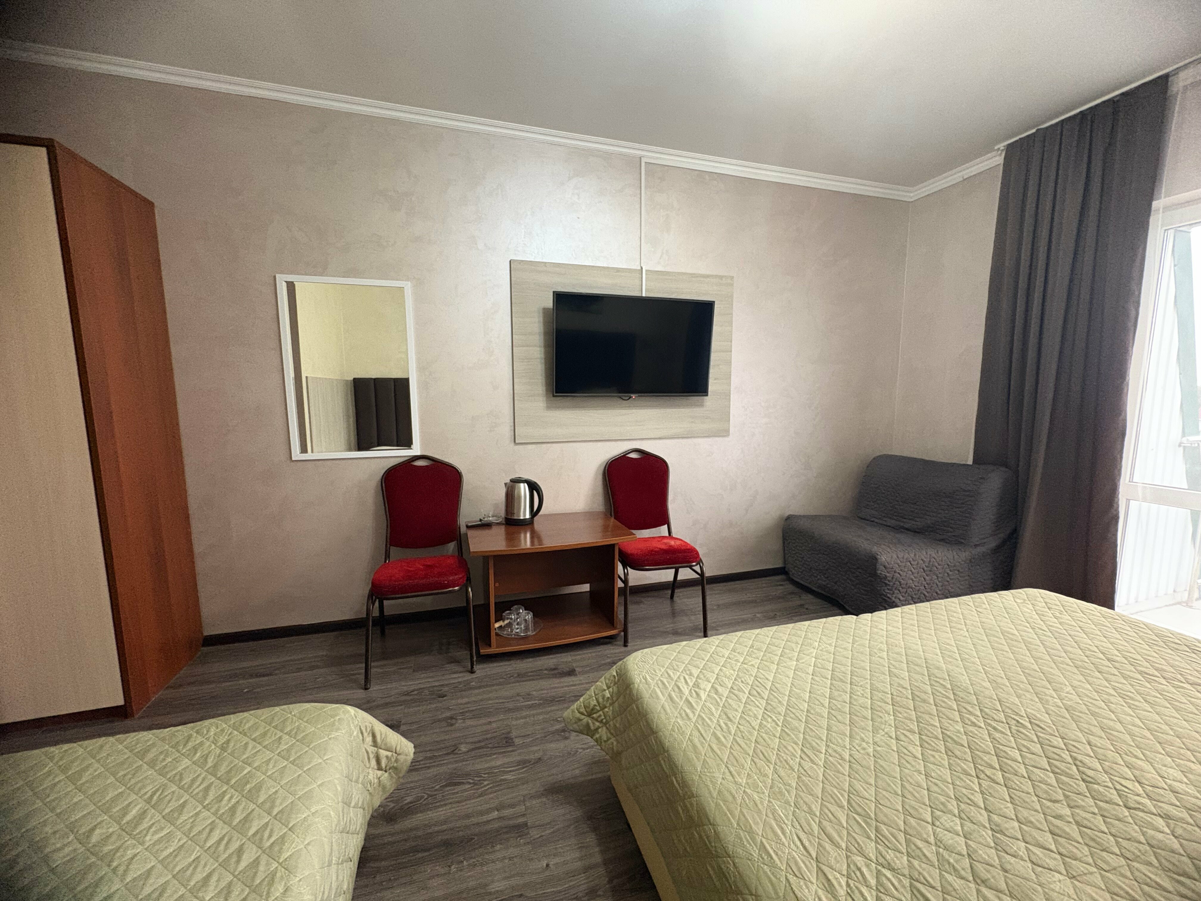 Улучшенный четырехместный номер