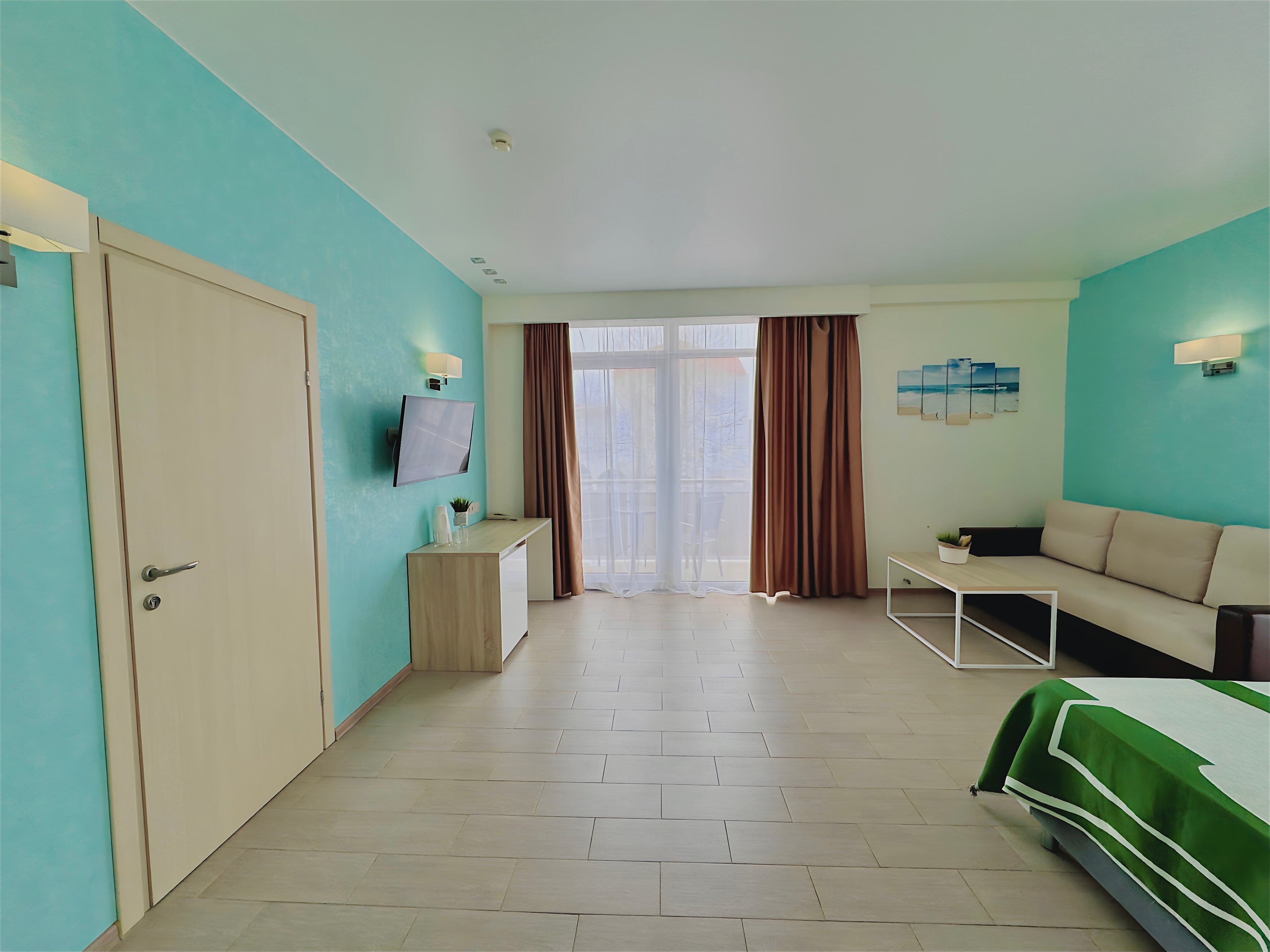 Четырехместный номер Делюкс