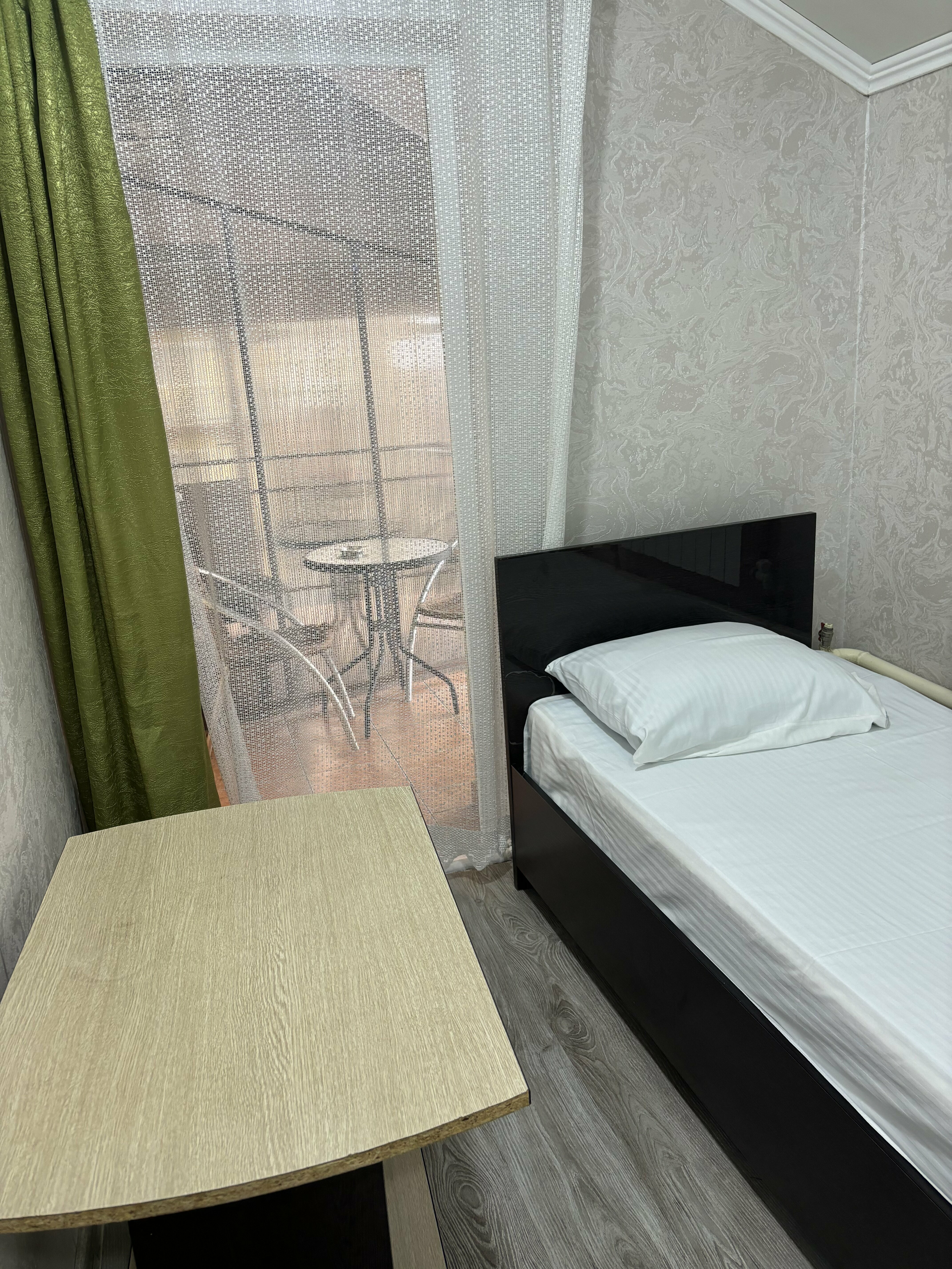 Четырехместный номер с балконом