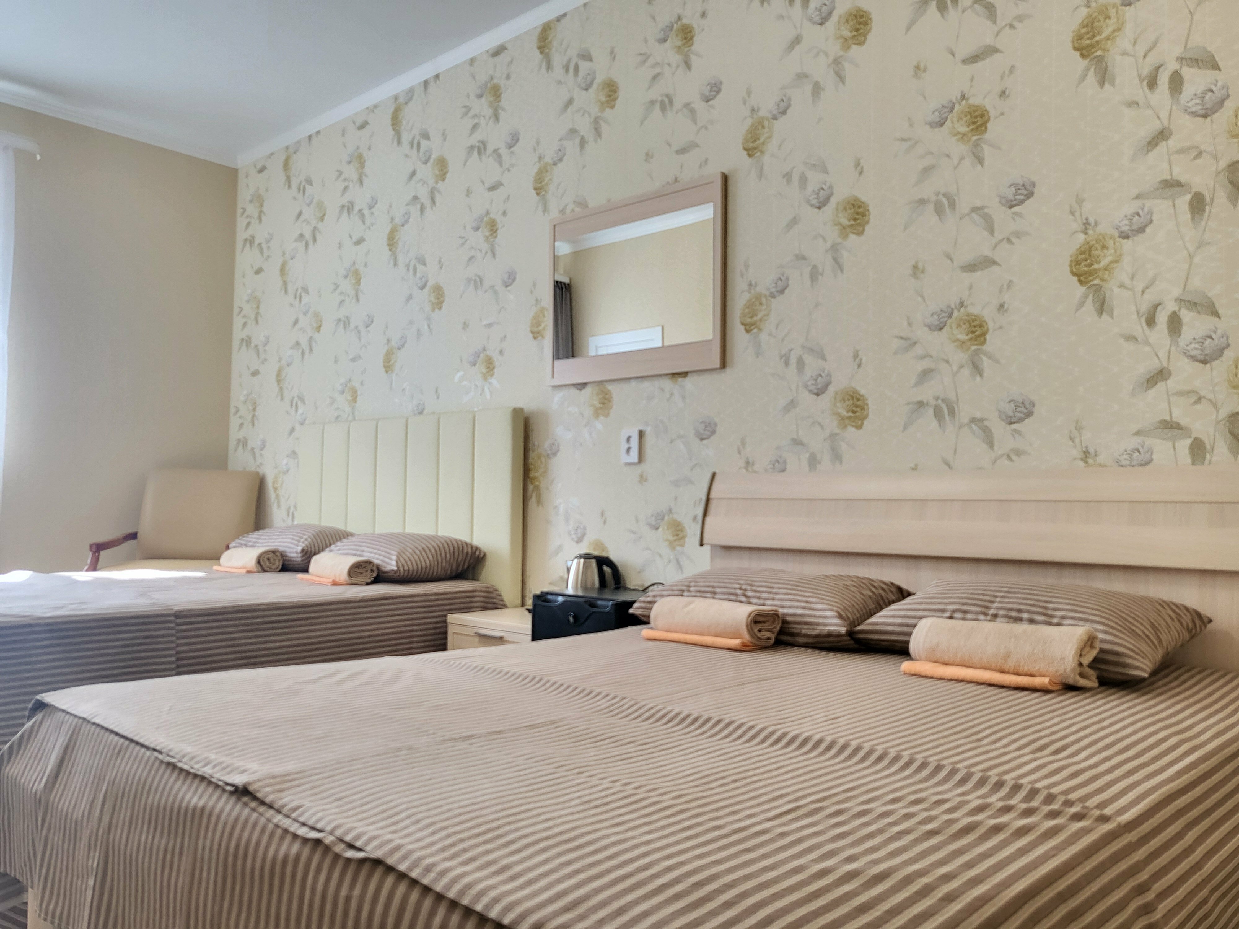 Улучшенный четырехместный номер