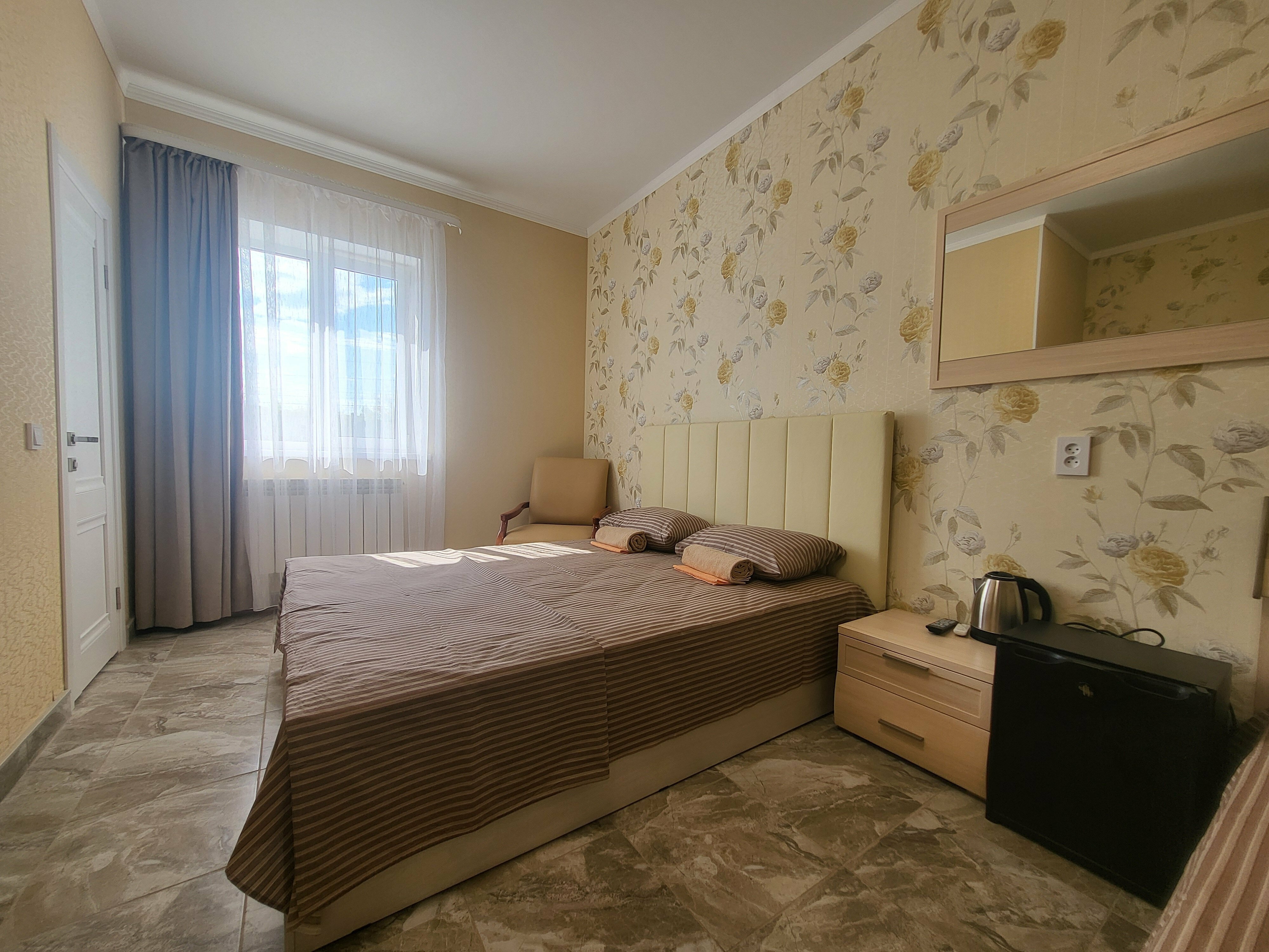 Улучшенный четырехместный номер