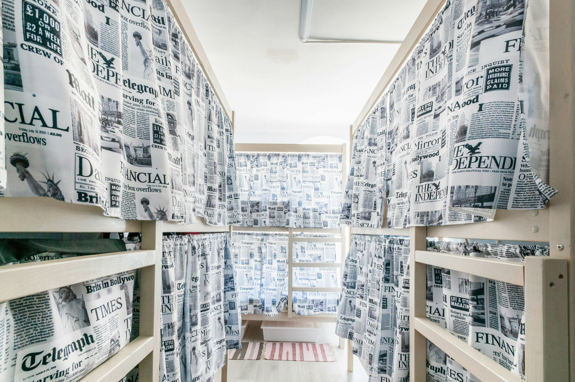 Спальное место на двухъярусной кровати в общем номере для мужчин