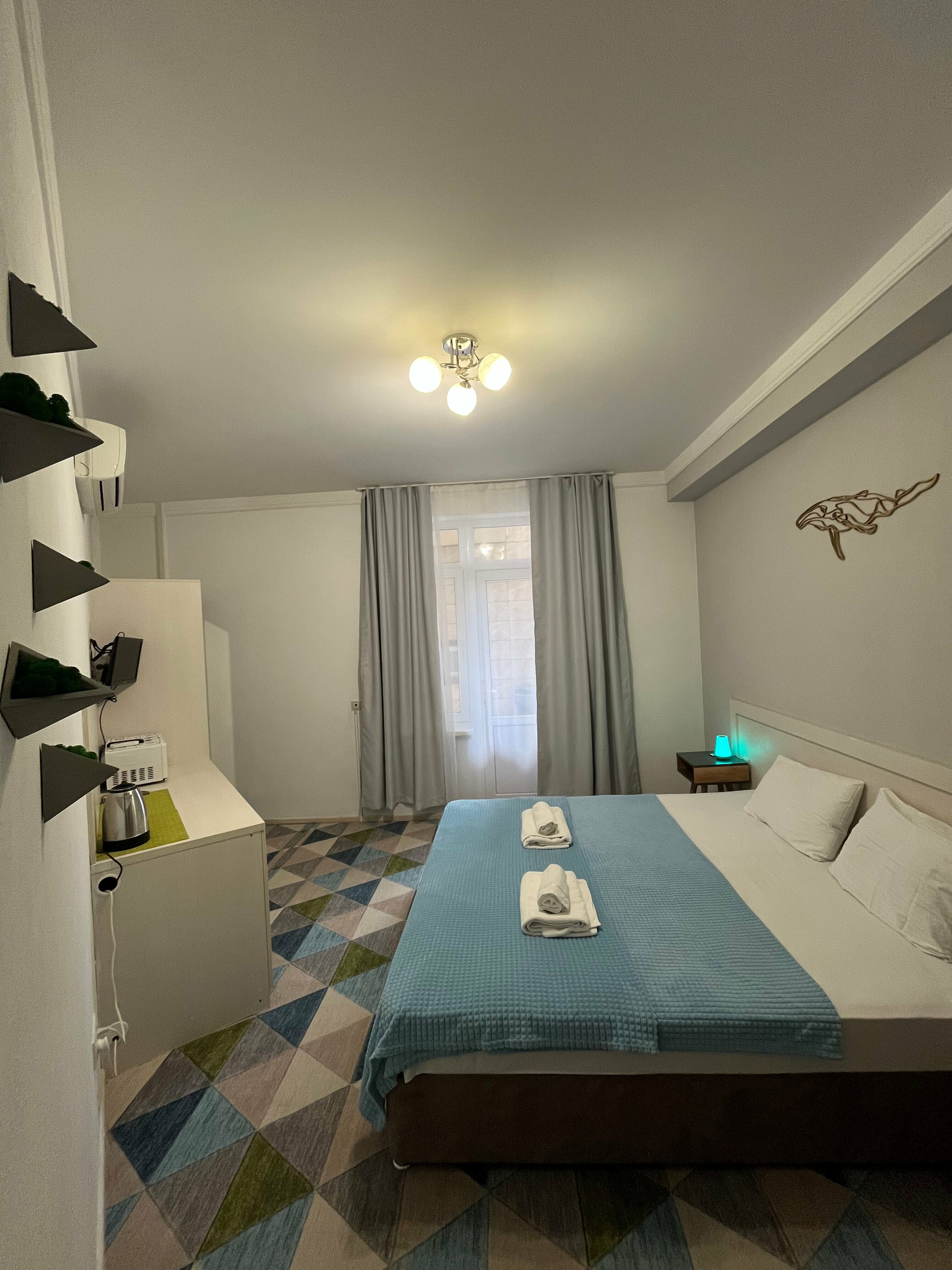 Улучшенный номер с кроватью "King-size" или двумя отдельными кроватями и доп. местом