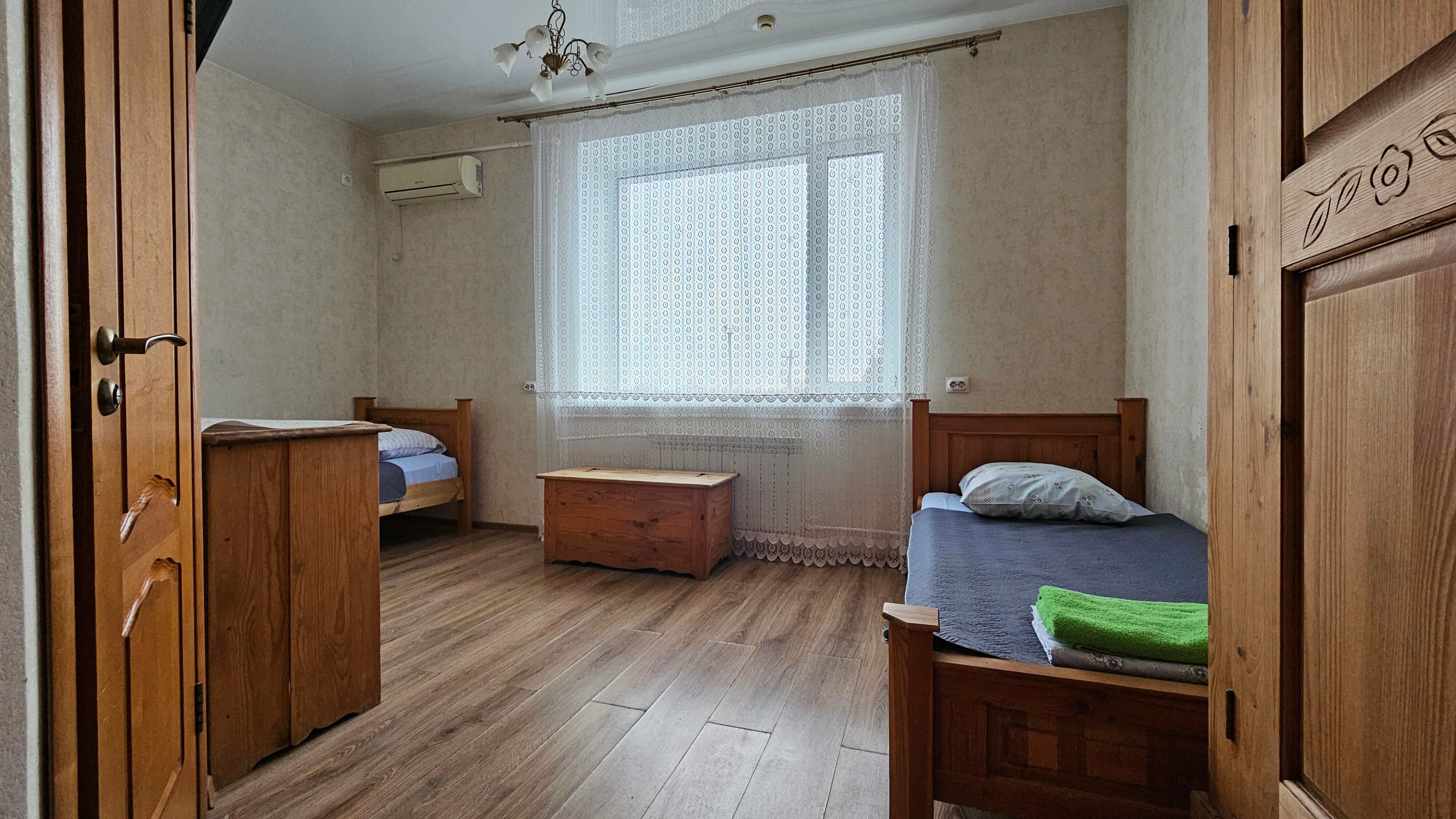 Двухместный номер с 2 отдельными кроватями и душем