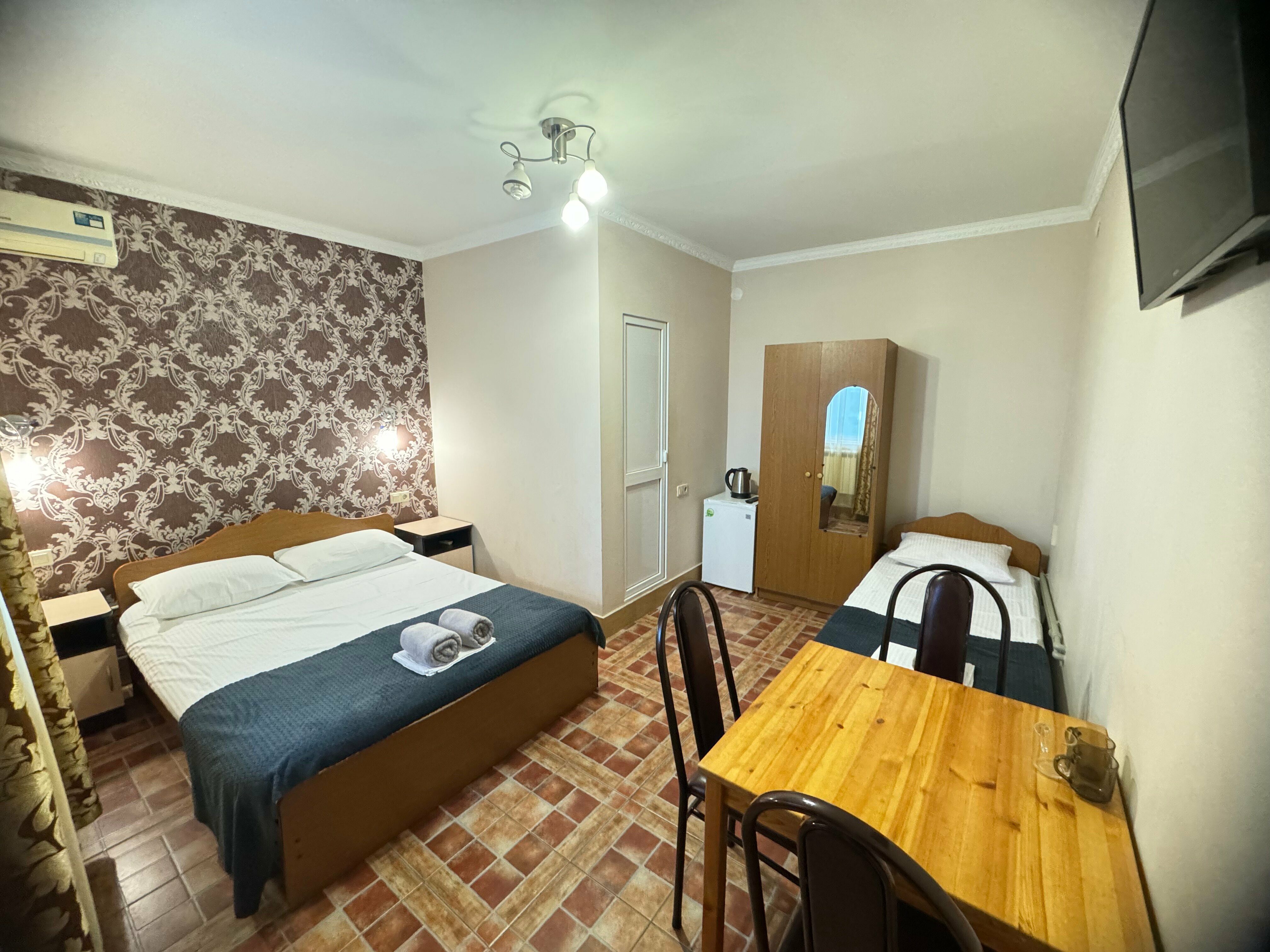 Трехместный номер с душем