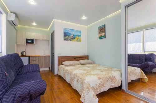 Трехместный номер с мини-кухней в Villa te Fiti