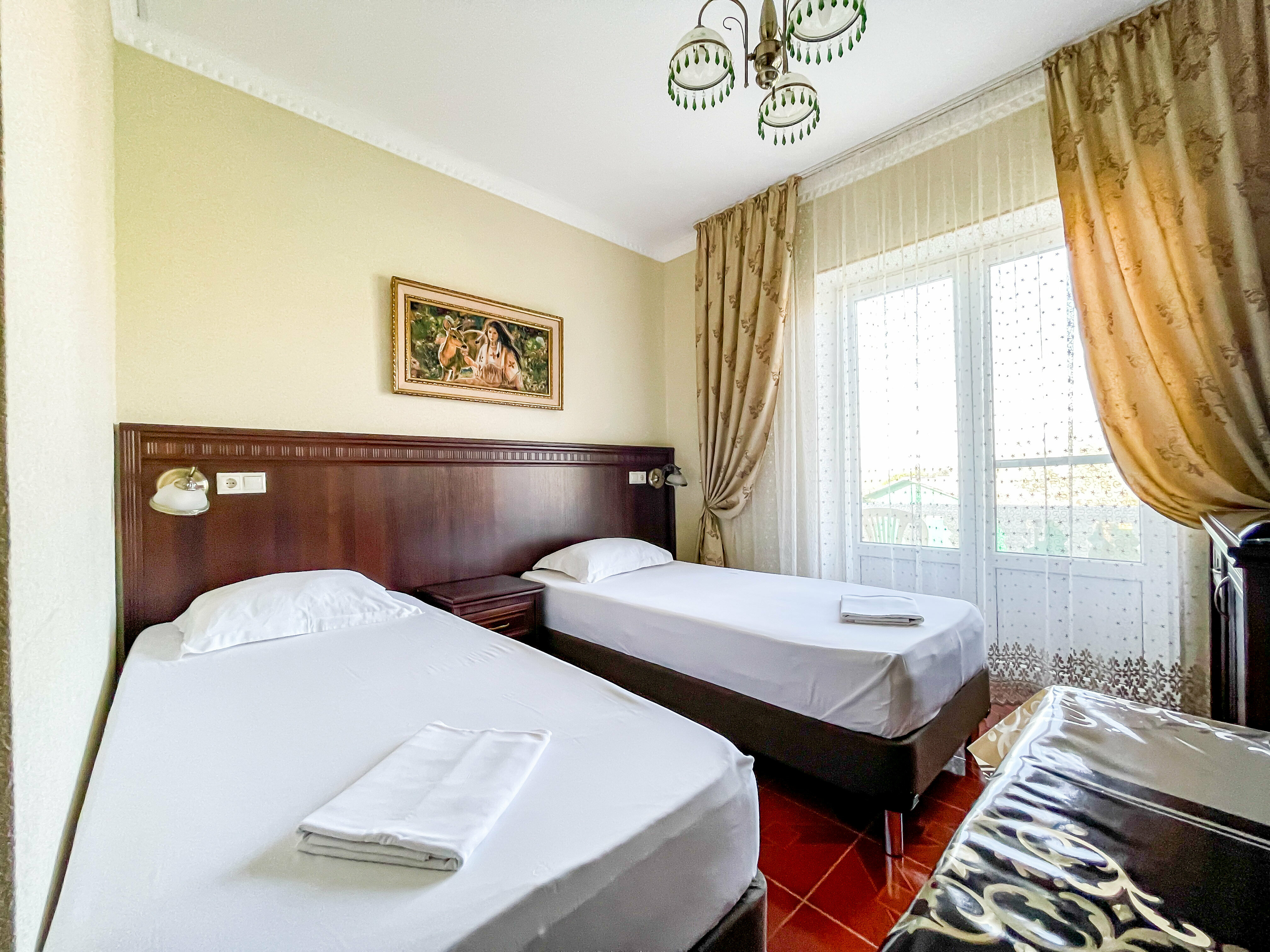 Двухместный номер Делюкс с 2 двуспальными кроватями