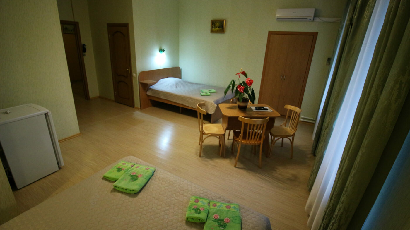 Трехместный номер Делюкс