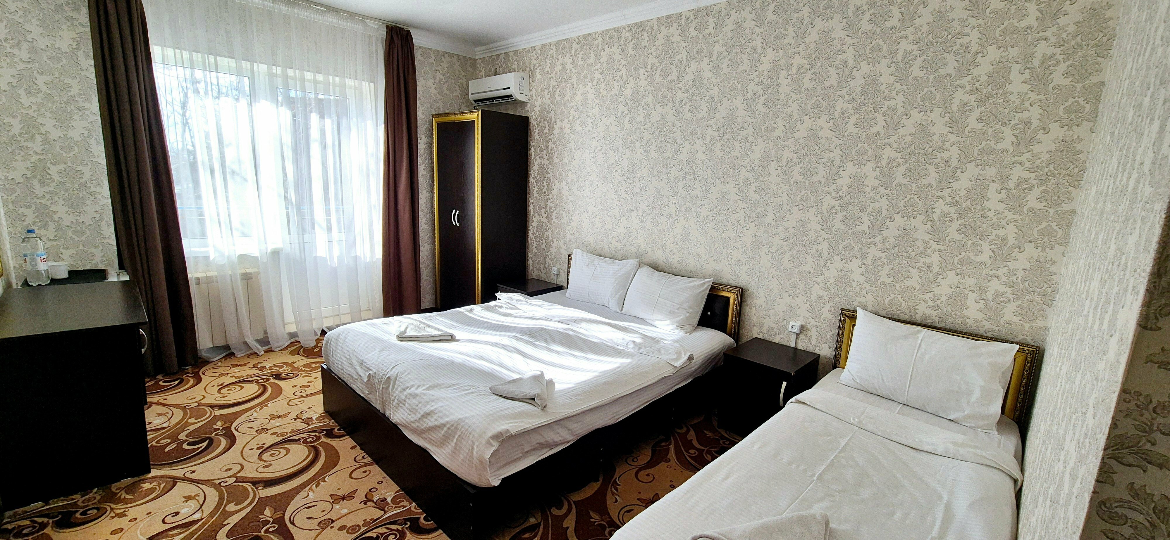 Трехместный номер с балконом