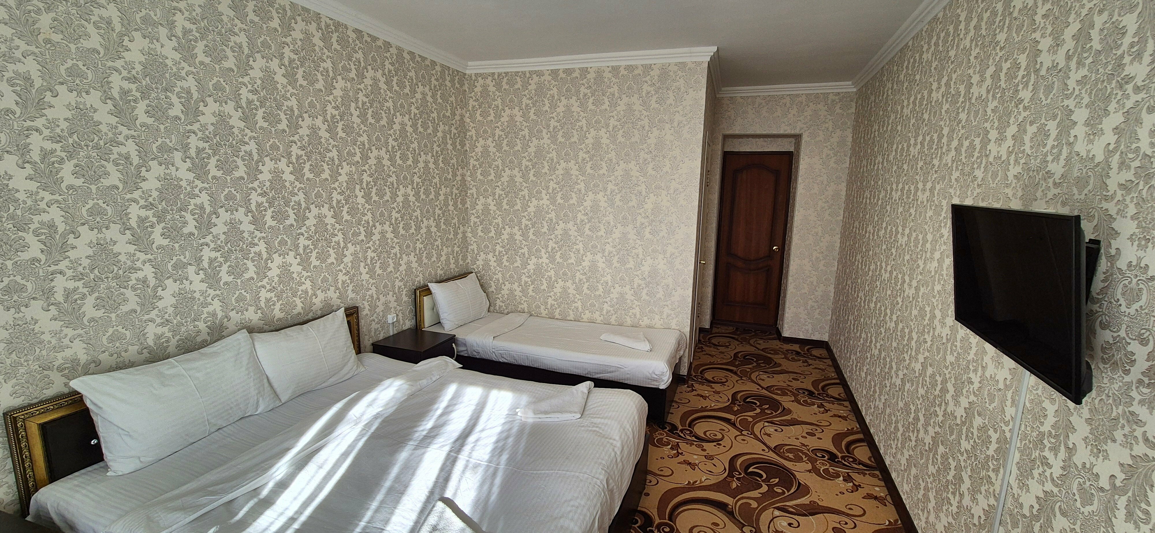 Трехместный номер с балконом