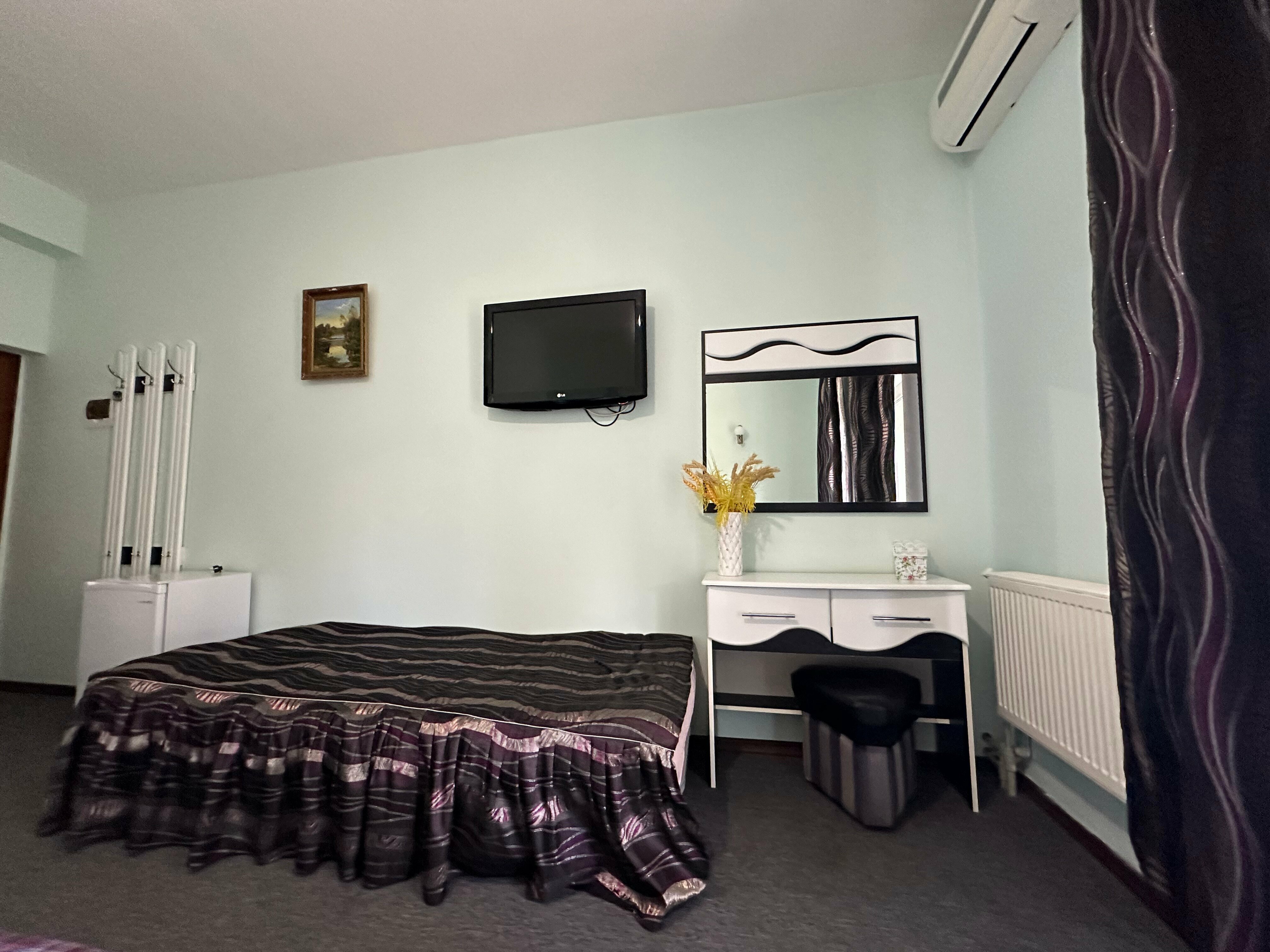 Трехместный номер Делюкс