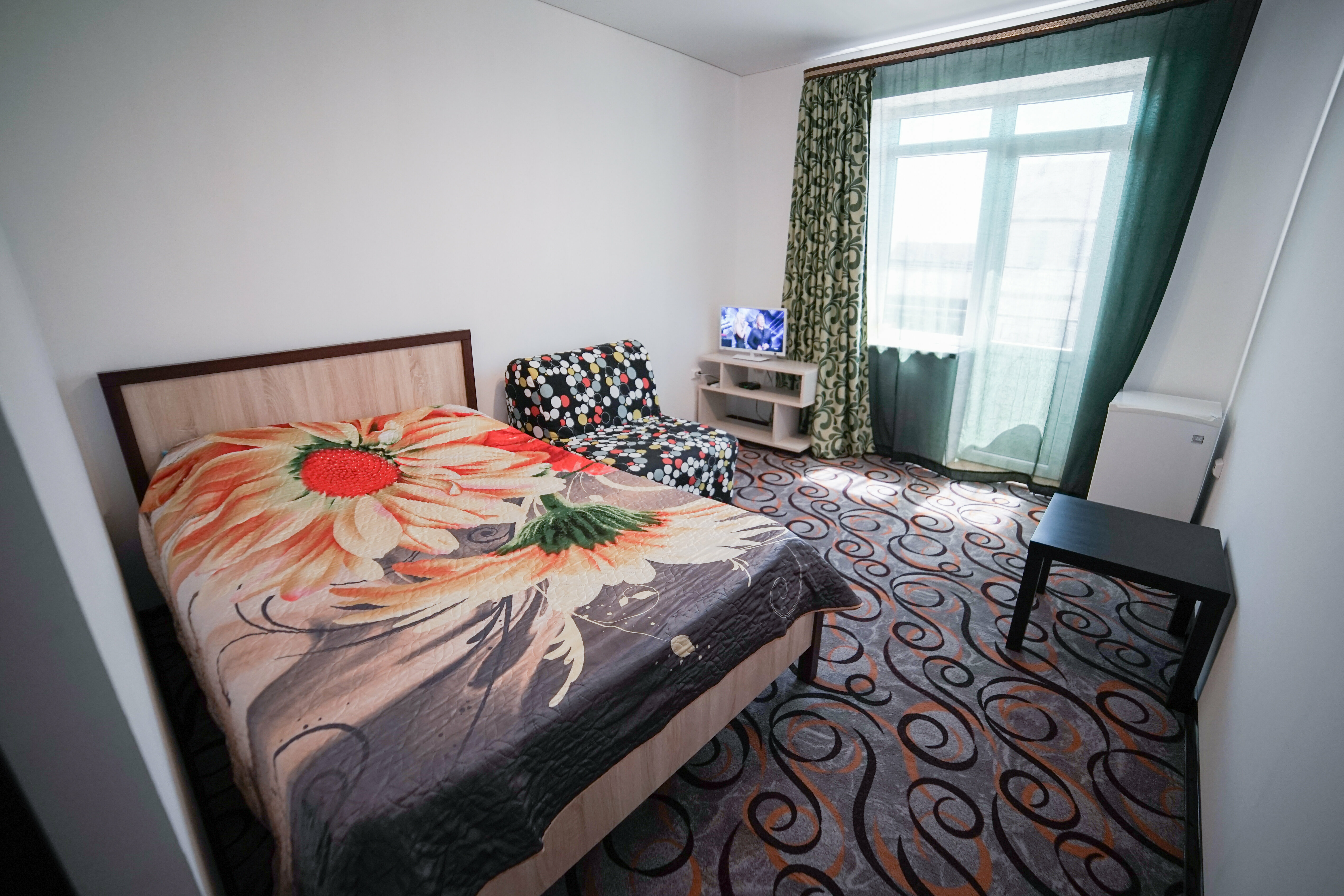 Трехместный номер с балконом