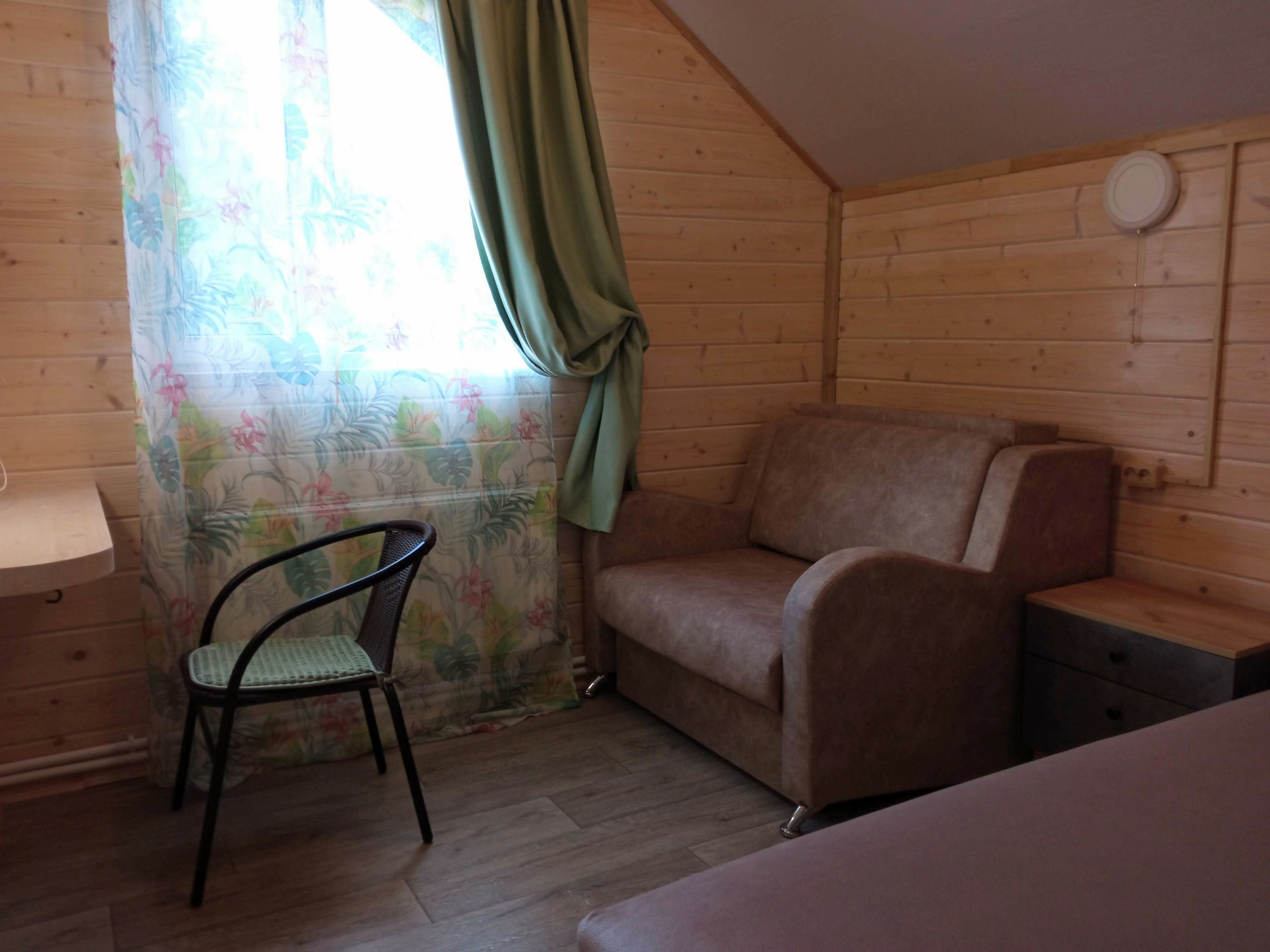 Двухэтажные апартаменты с террасой с видом на сад в "Доме на берегу"