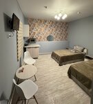 Стандартный номер с 2 односпальными кроватями и диваном в Купеческий дом