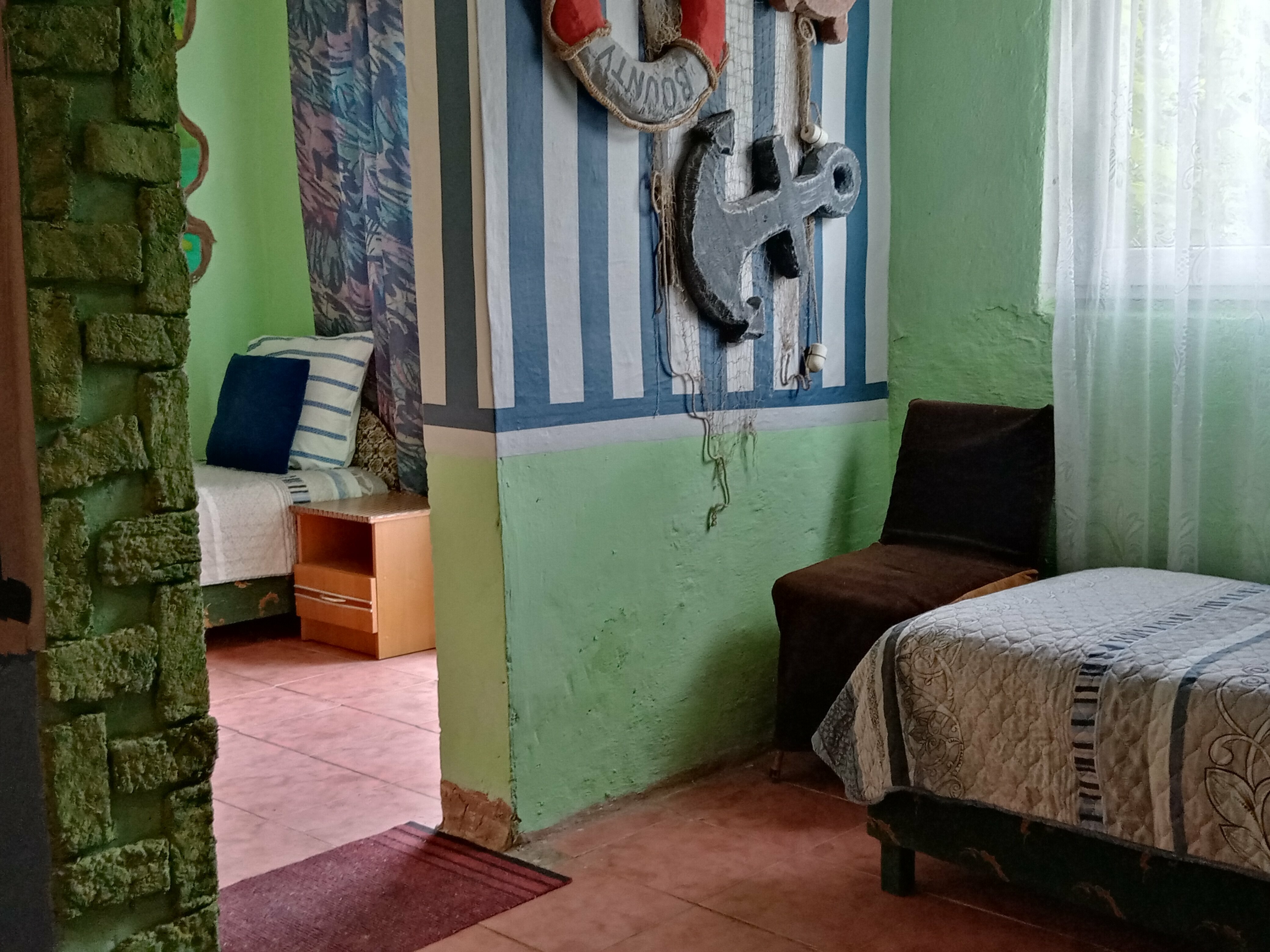 Четырехместный номер с видом на сад