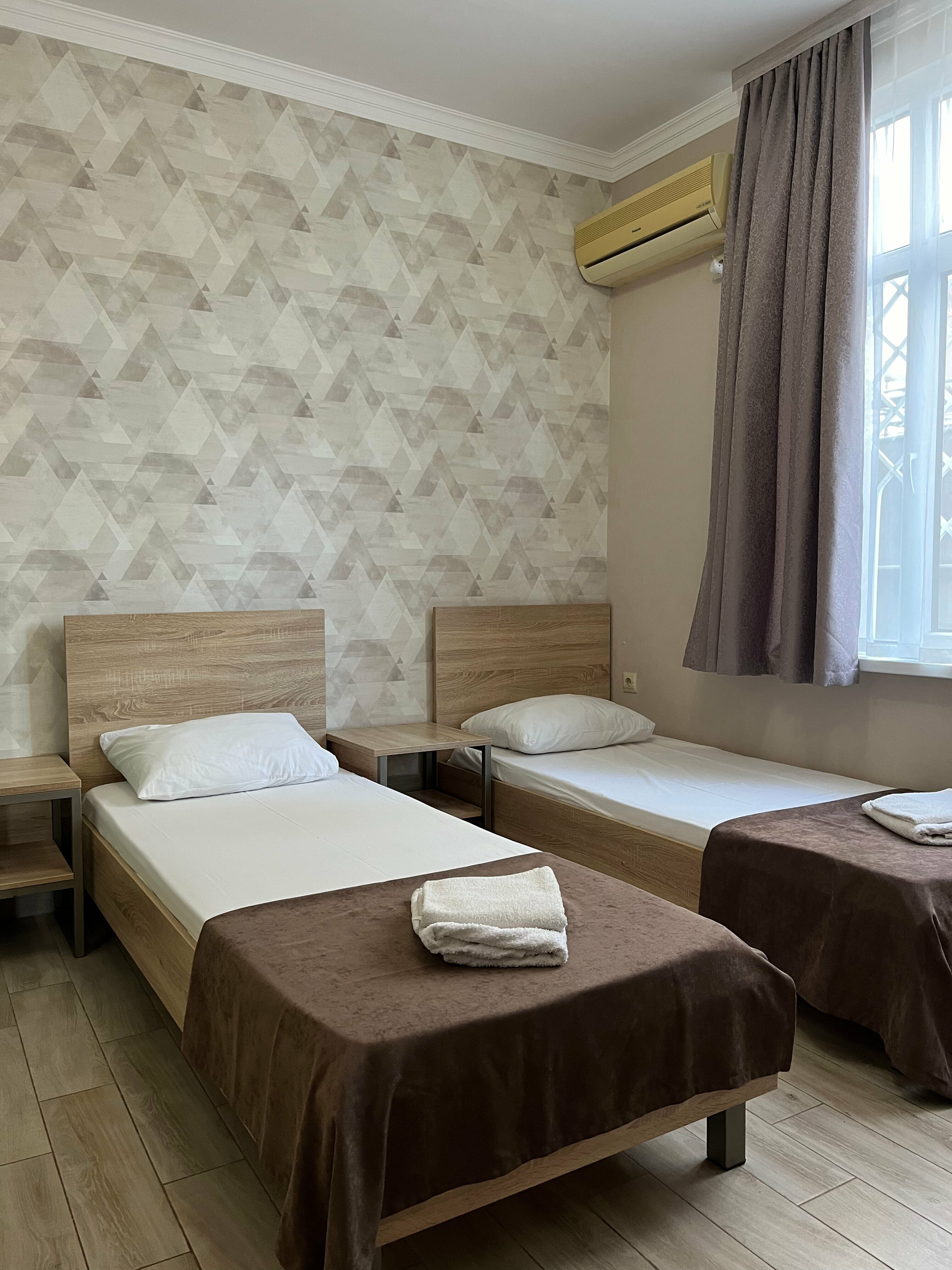 Улучшенный двухместный номер с 2 отдельными кроватями