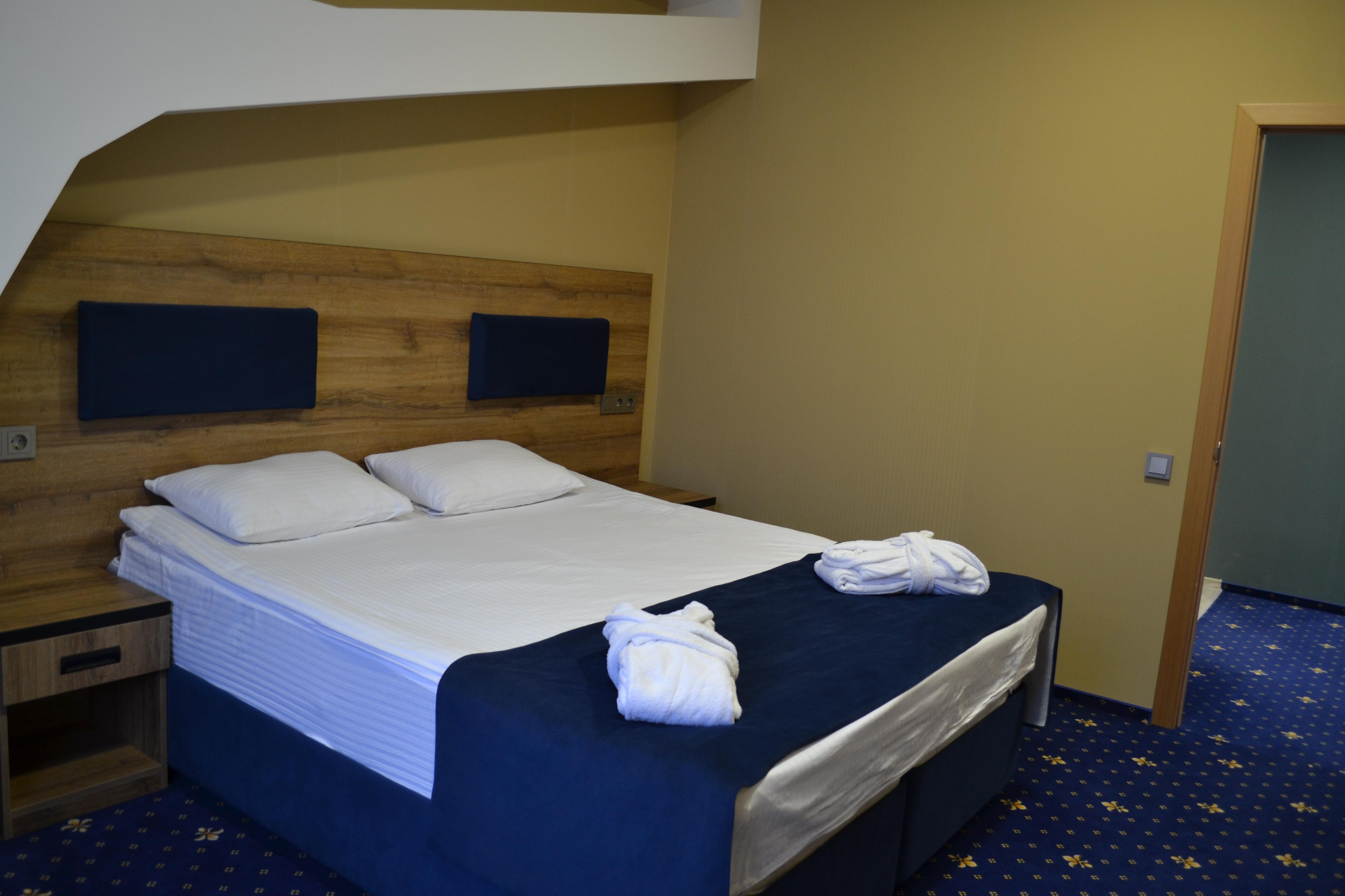 Номер категории "Люкс" с двумя спальнями и гостиной