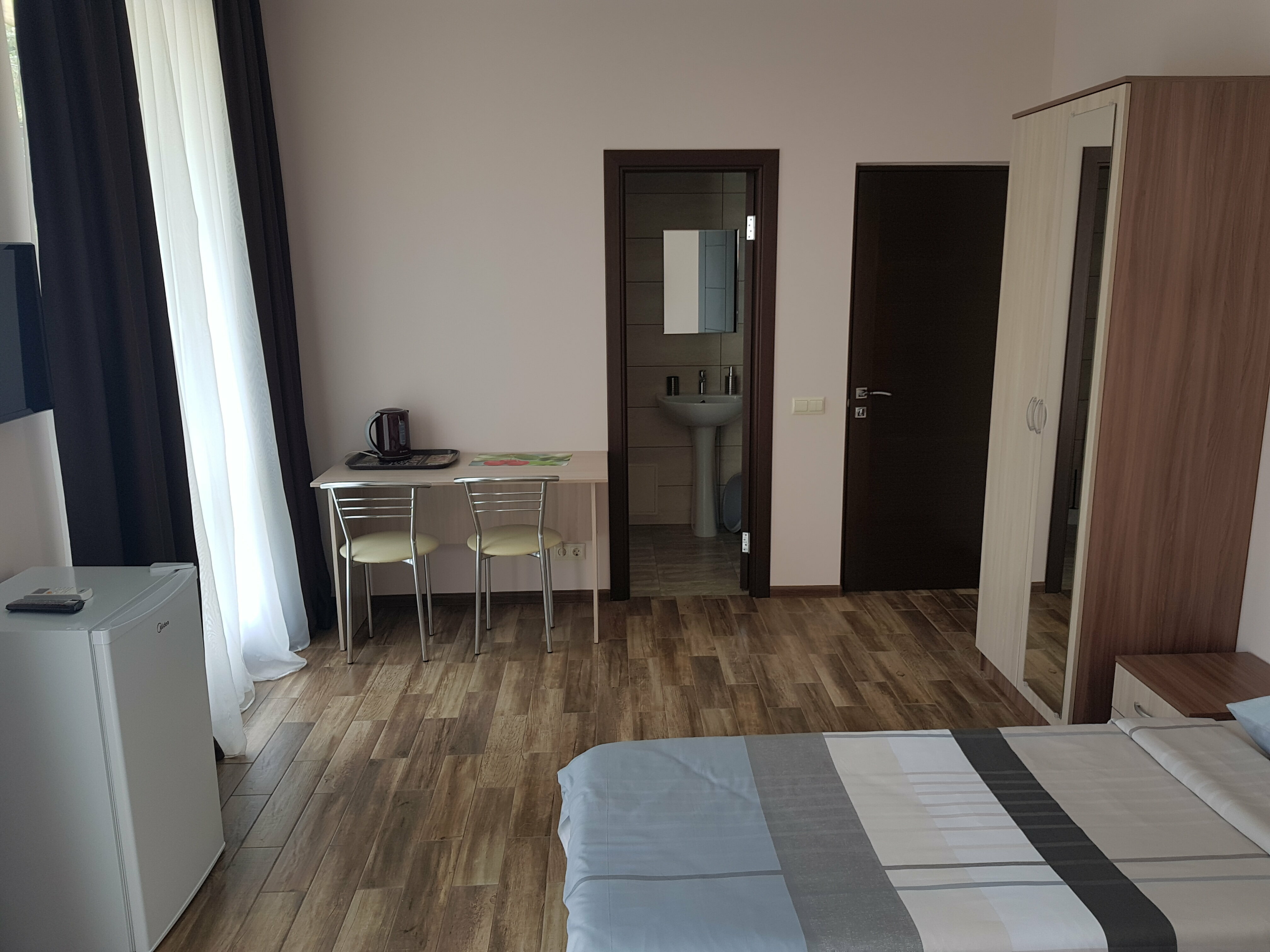 Двухместный номер с 1 кроватью или 2 отдельными кроватями и дополнительной кроватью