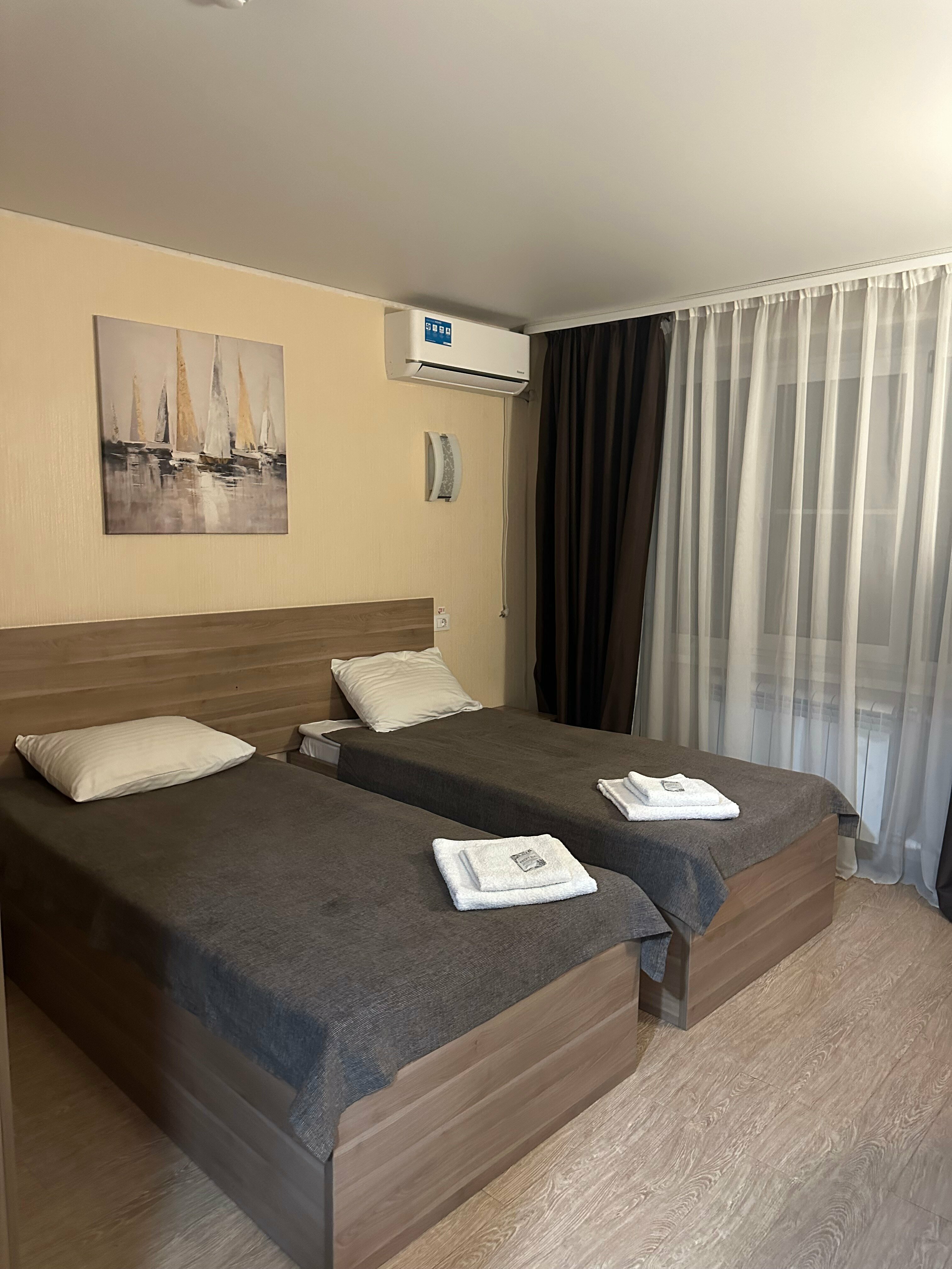 Двухместный номер с 2 отдельными кроватями и ванной