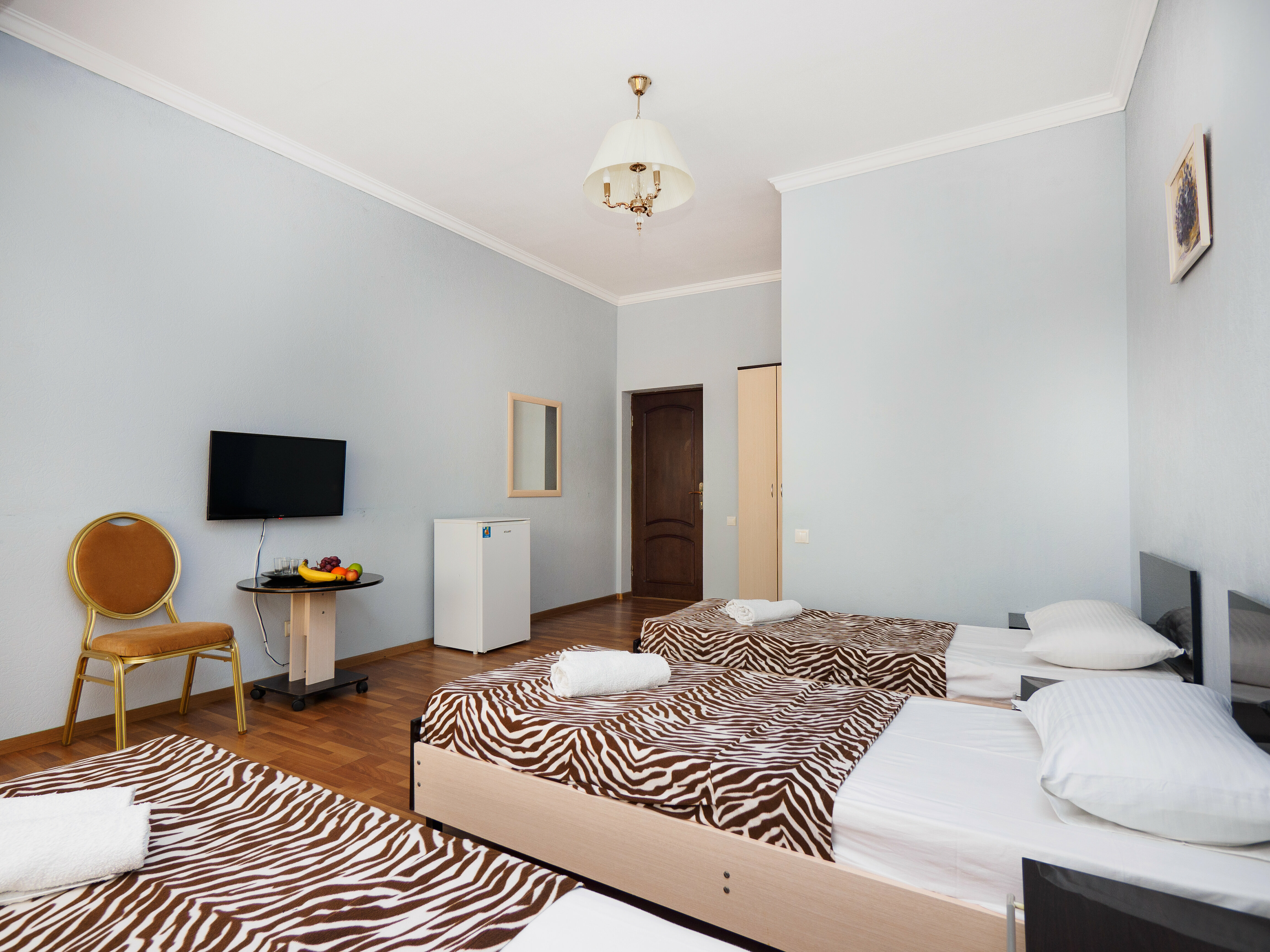 Трехместный номер с балконом