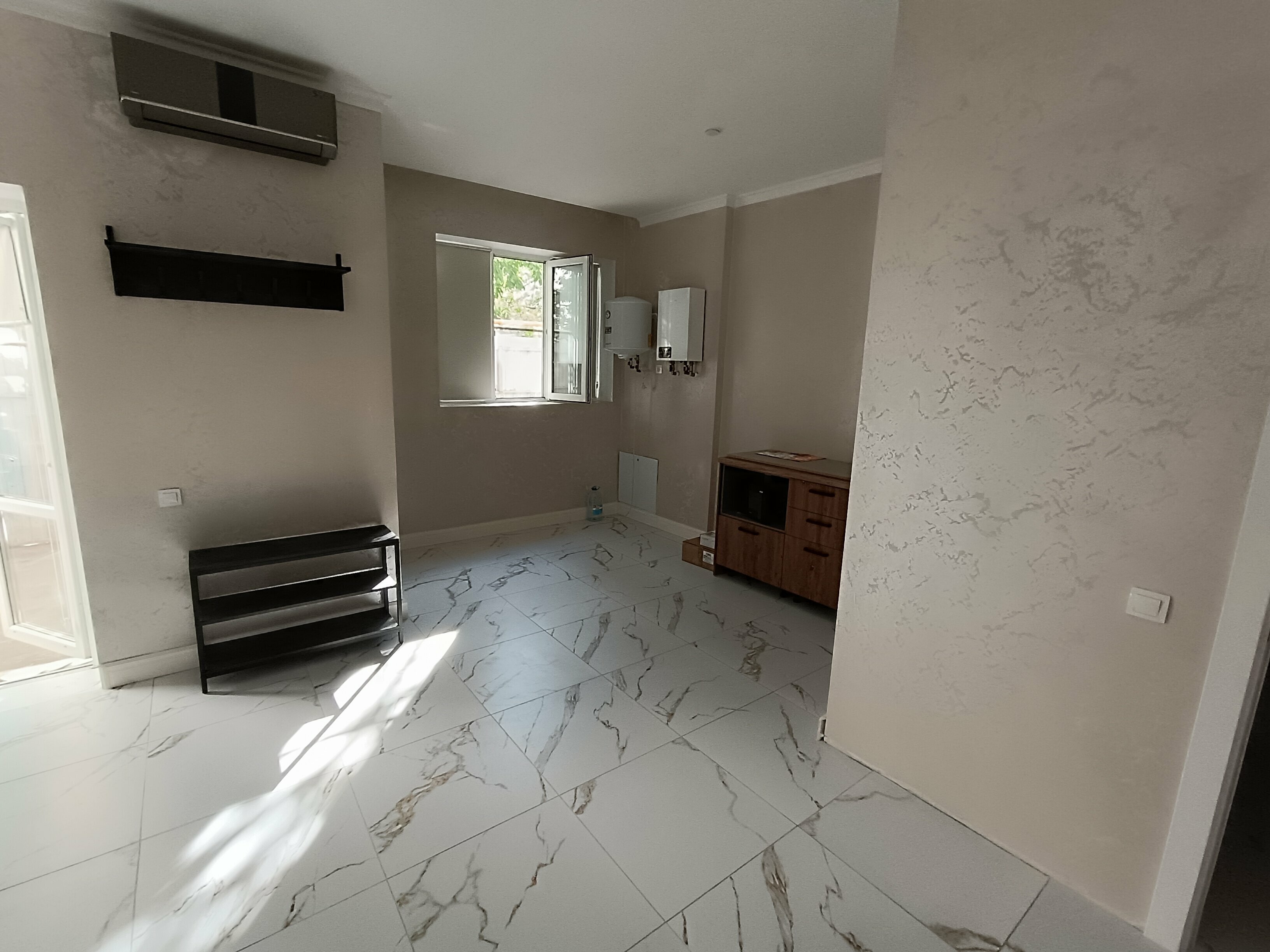 Четырехместный номер с видом на сад