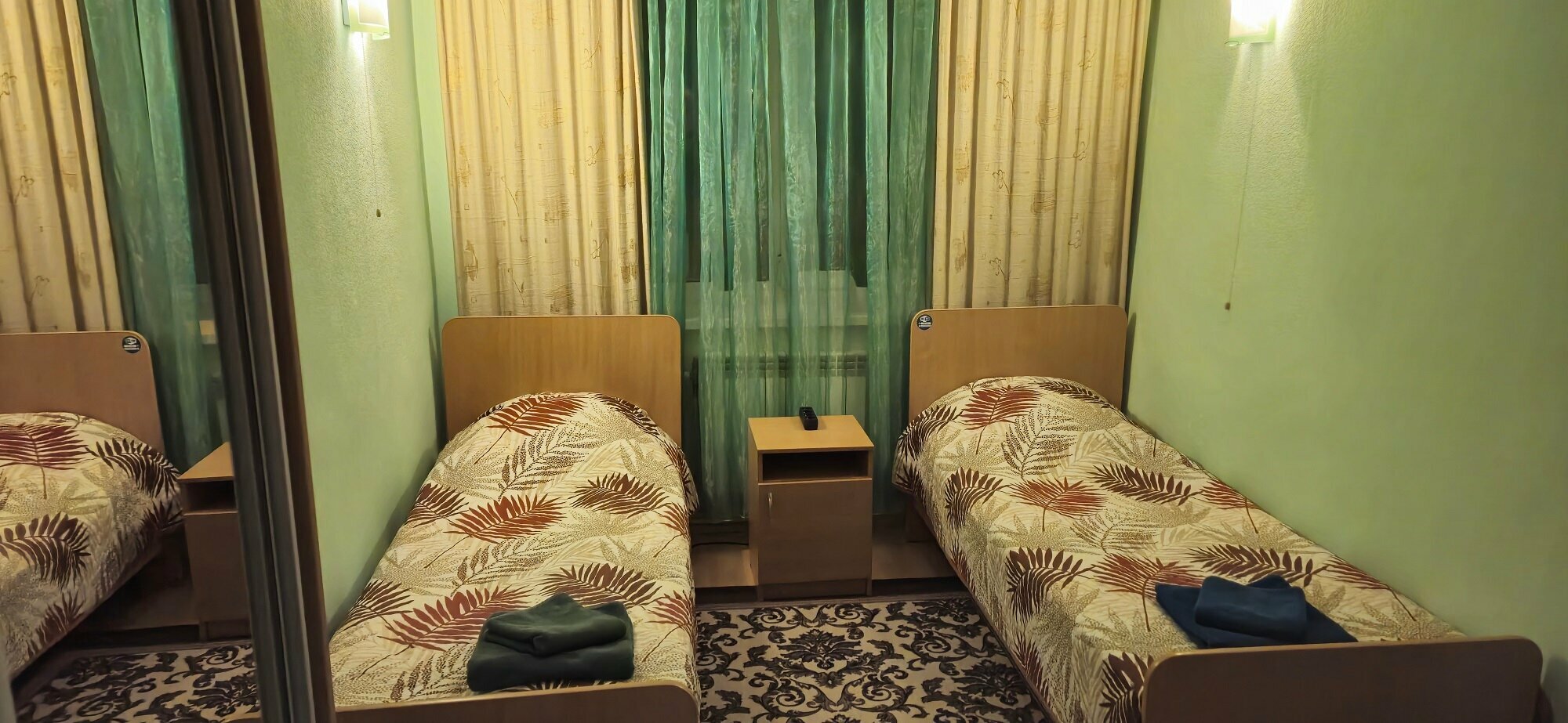 Двухместный номер с 2 отдельными кроватями и душем
