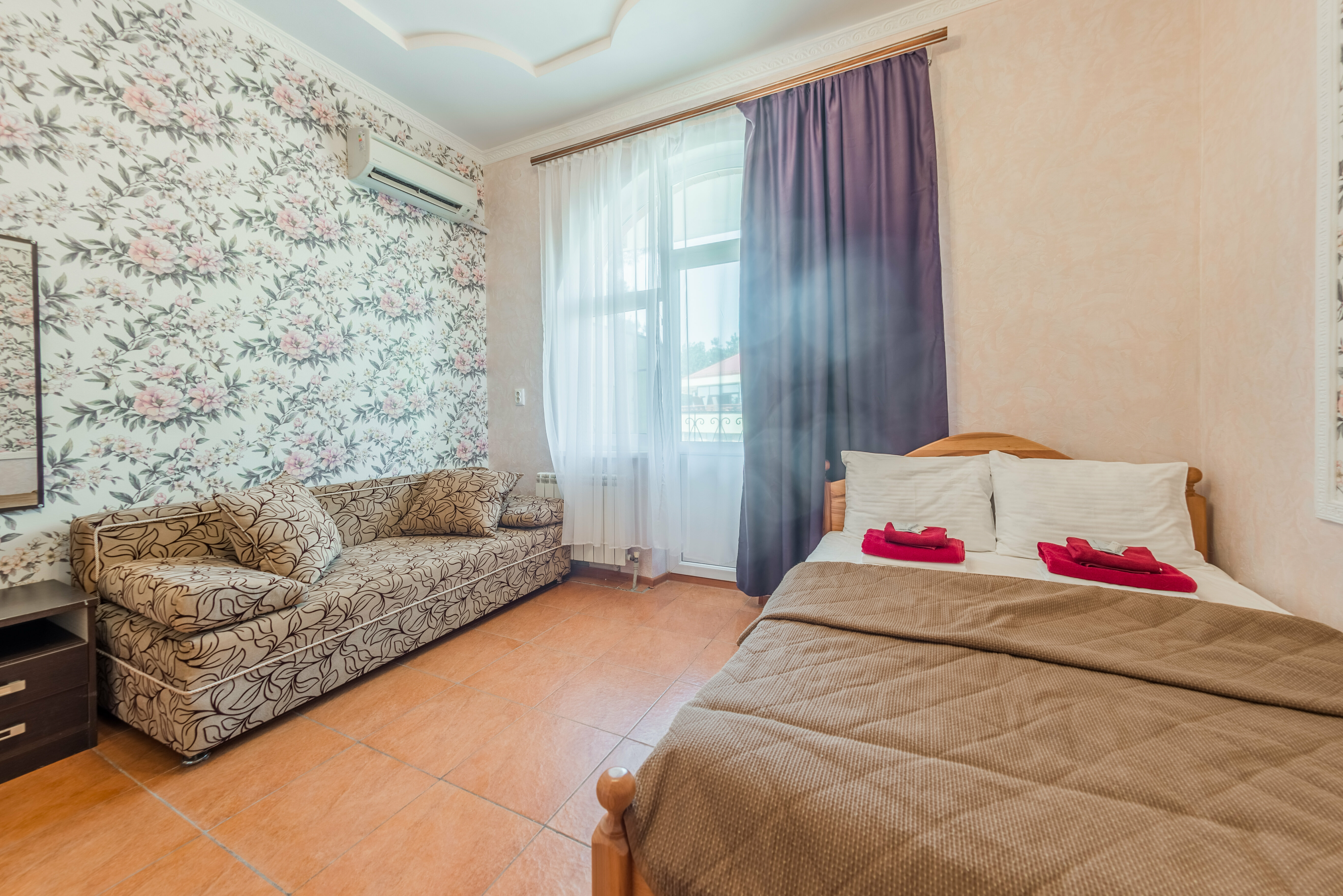 Трехместный номер с балконом