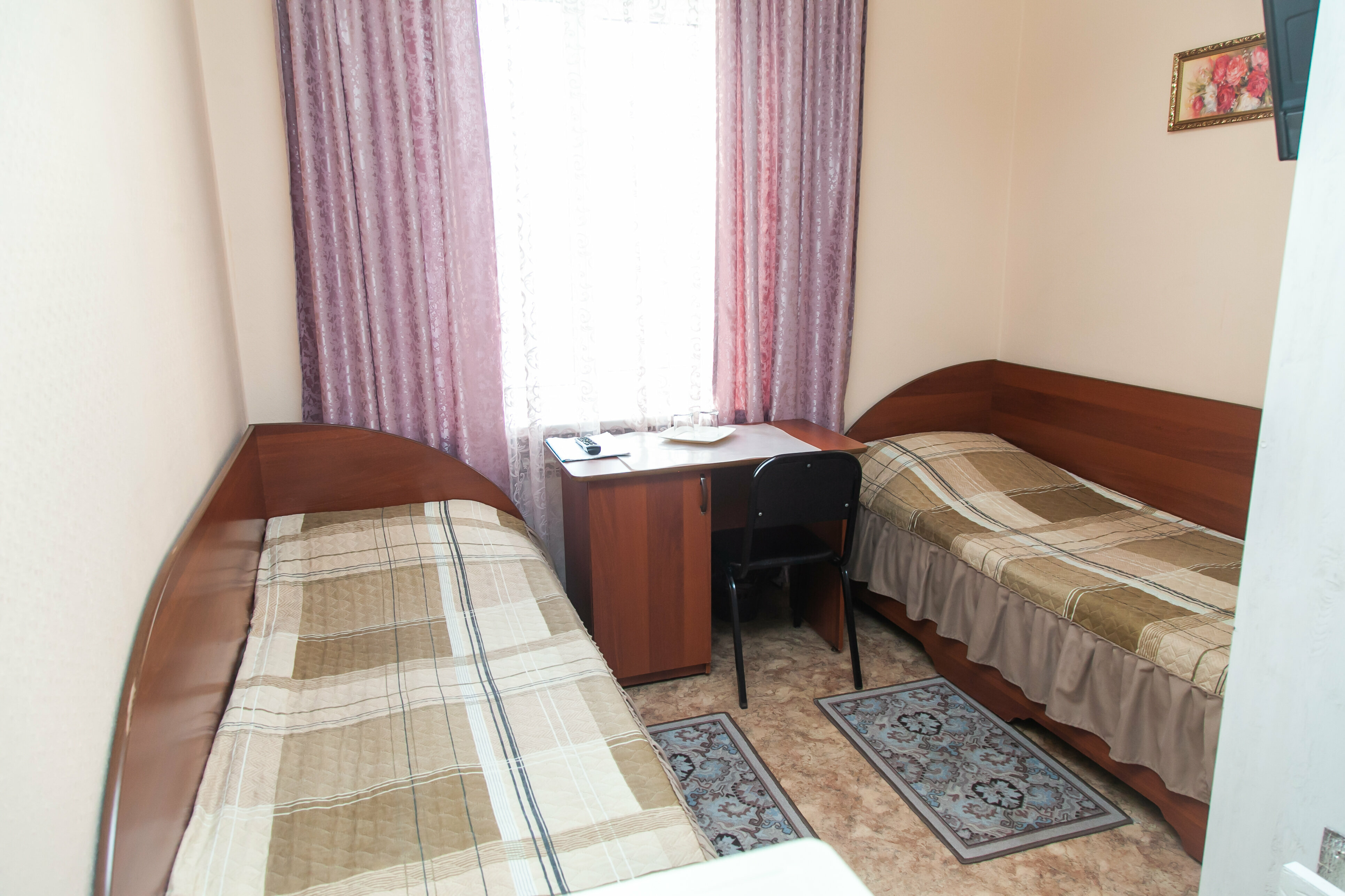 Двухместный номер с 2 отдельными кроватями и душем