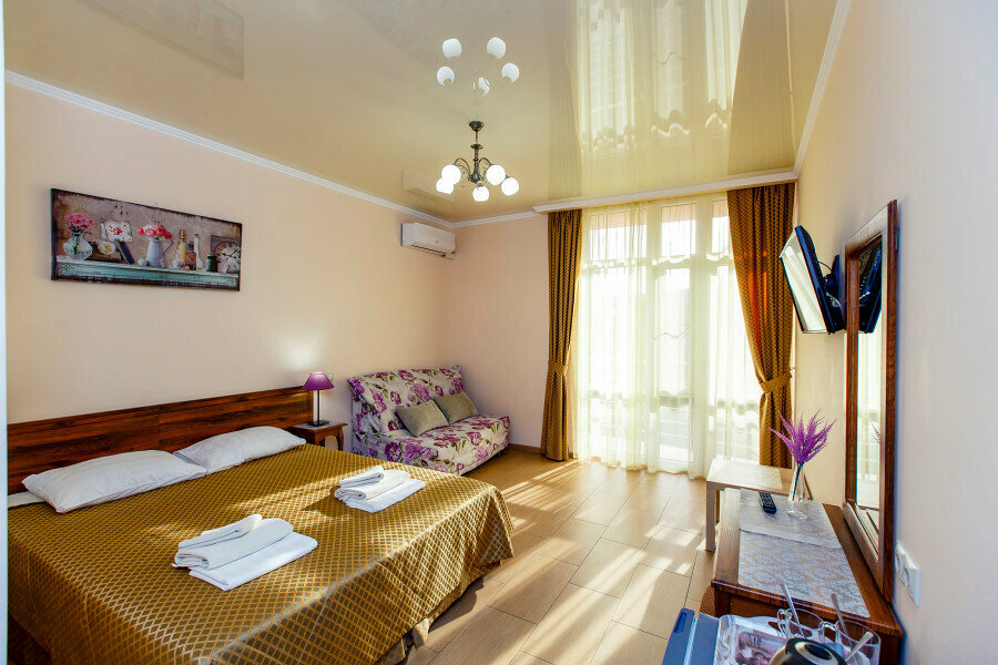 Четырехместный полулюкс с балконом