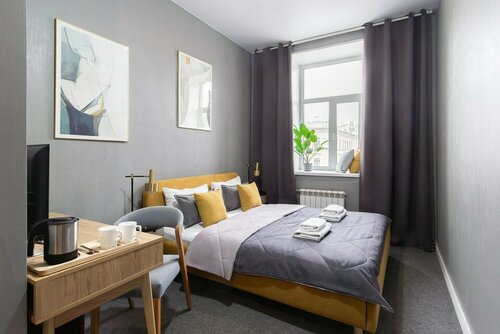 Стандартный номер с видом из окон на Невский проспект в Lopatin Невский 100