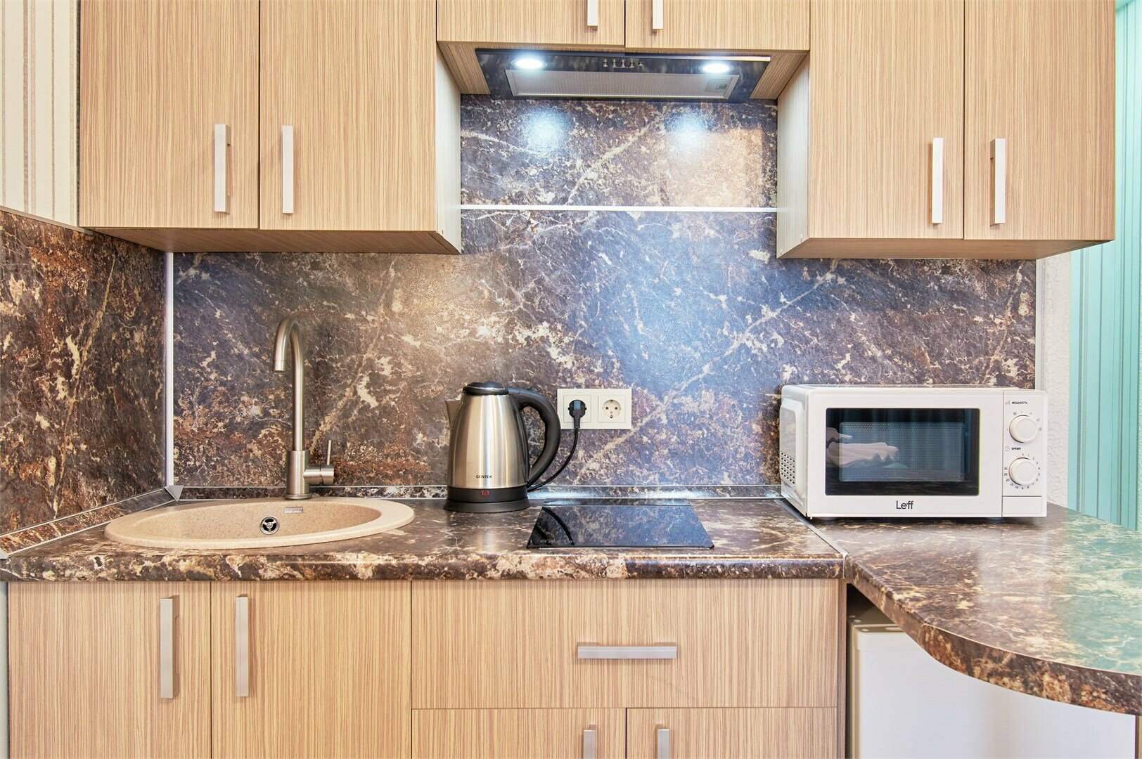 Трехместный номер с кухней и французским балконом