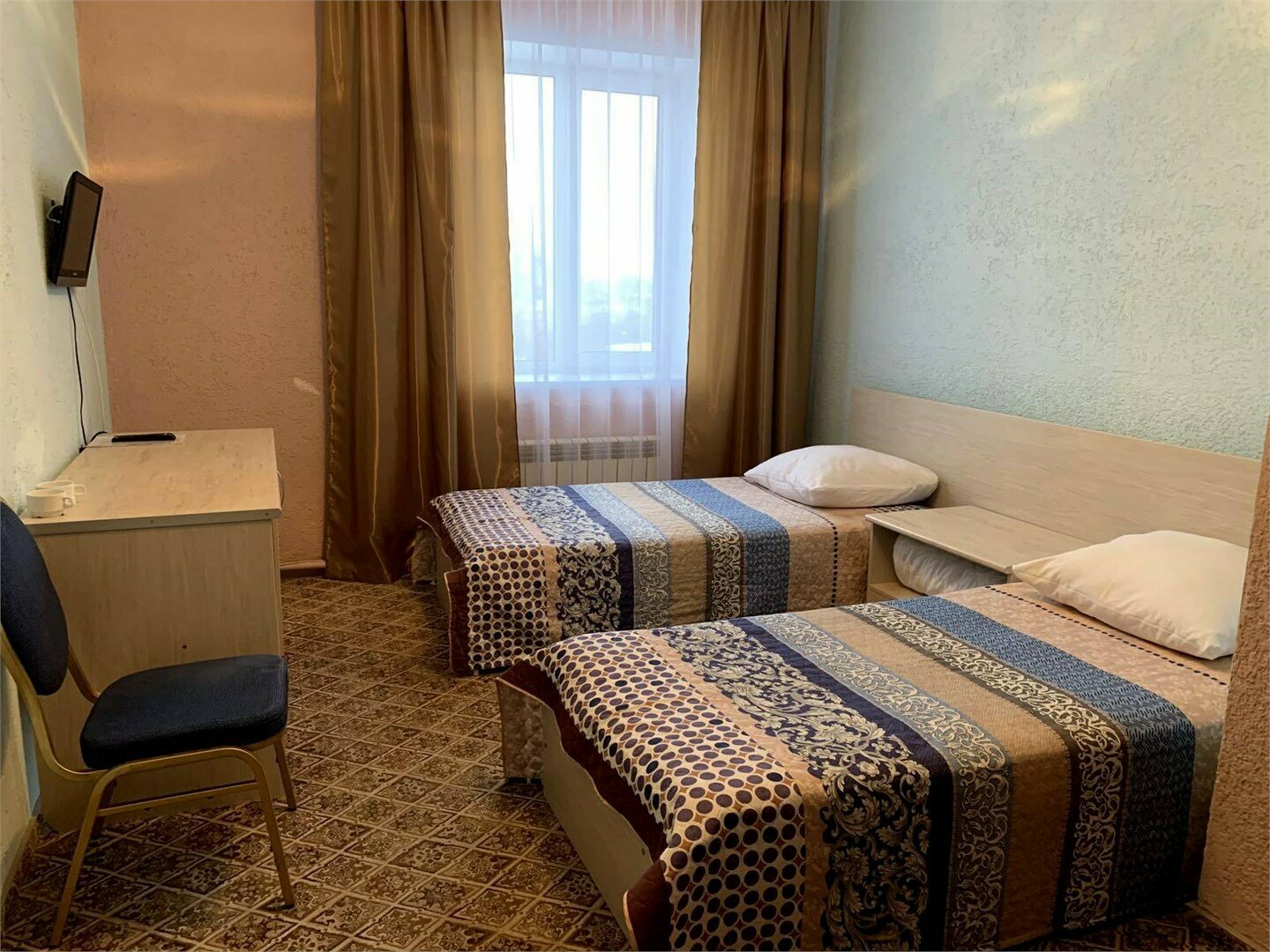 Двухместный стандарт (с двумя раздельными кроватями)