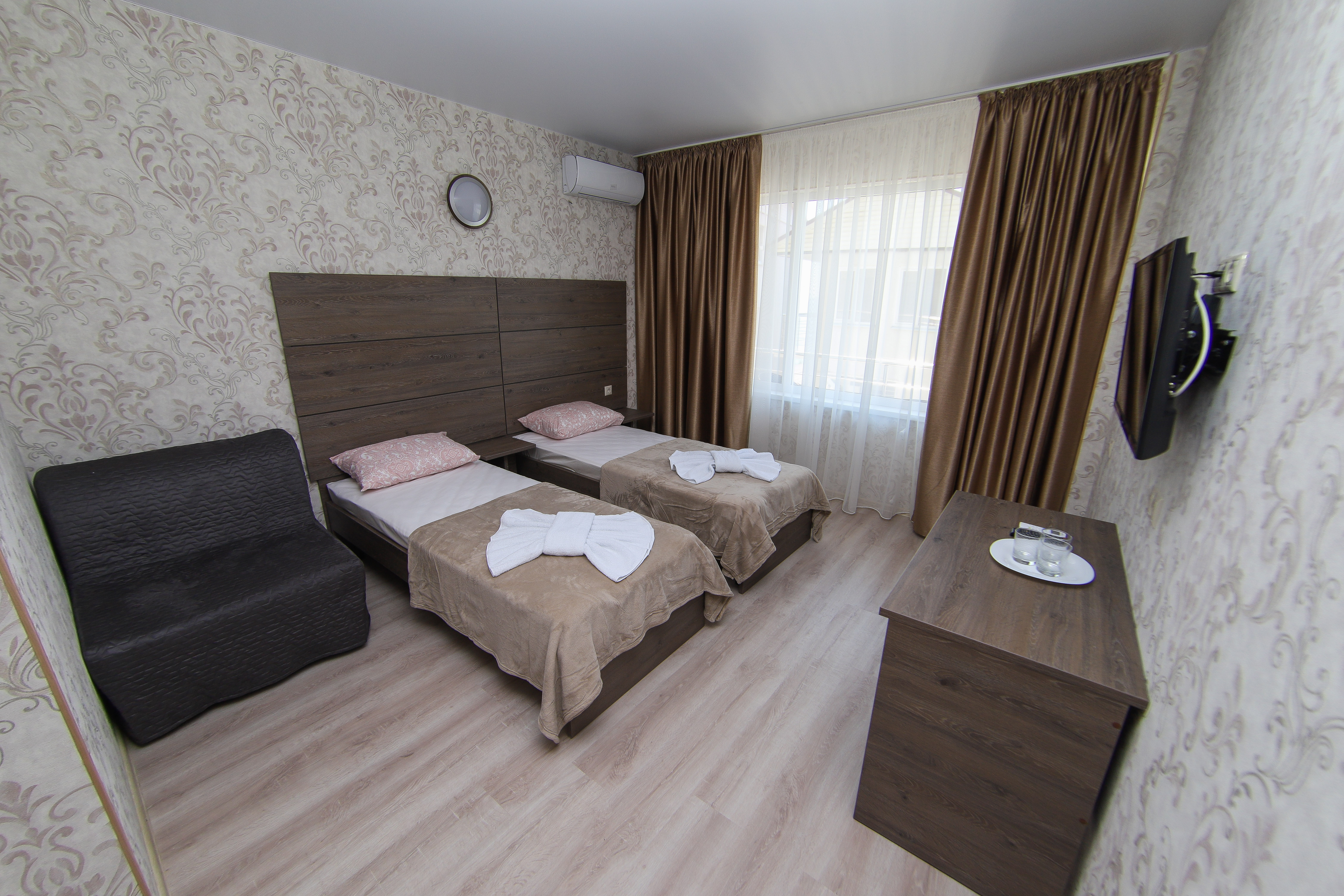 Трехместный номер Делюкс